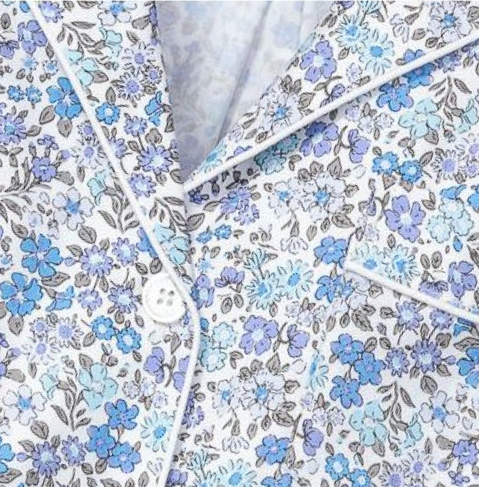 Close up of blue flower design on Pajama Top