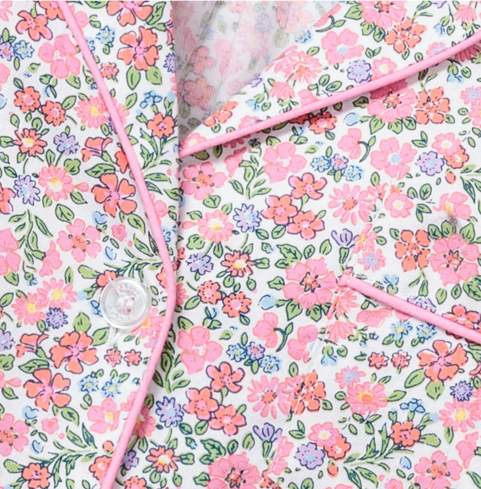Close up of pink flower design on Pajama Top