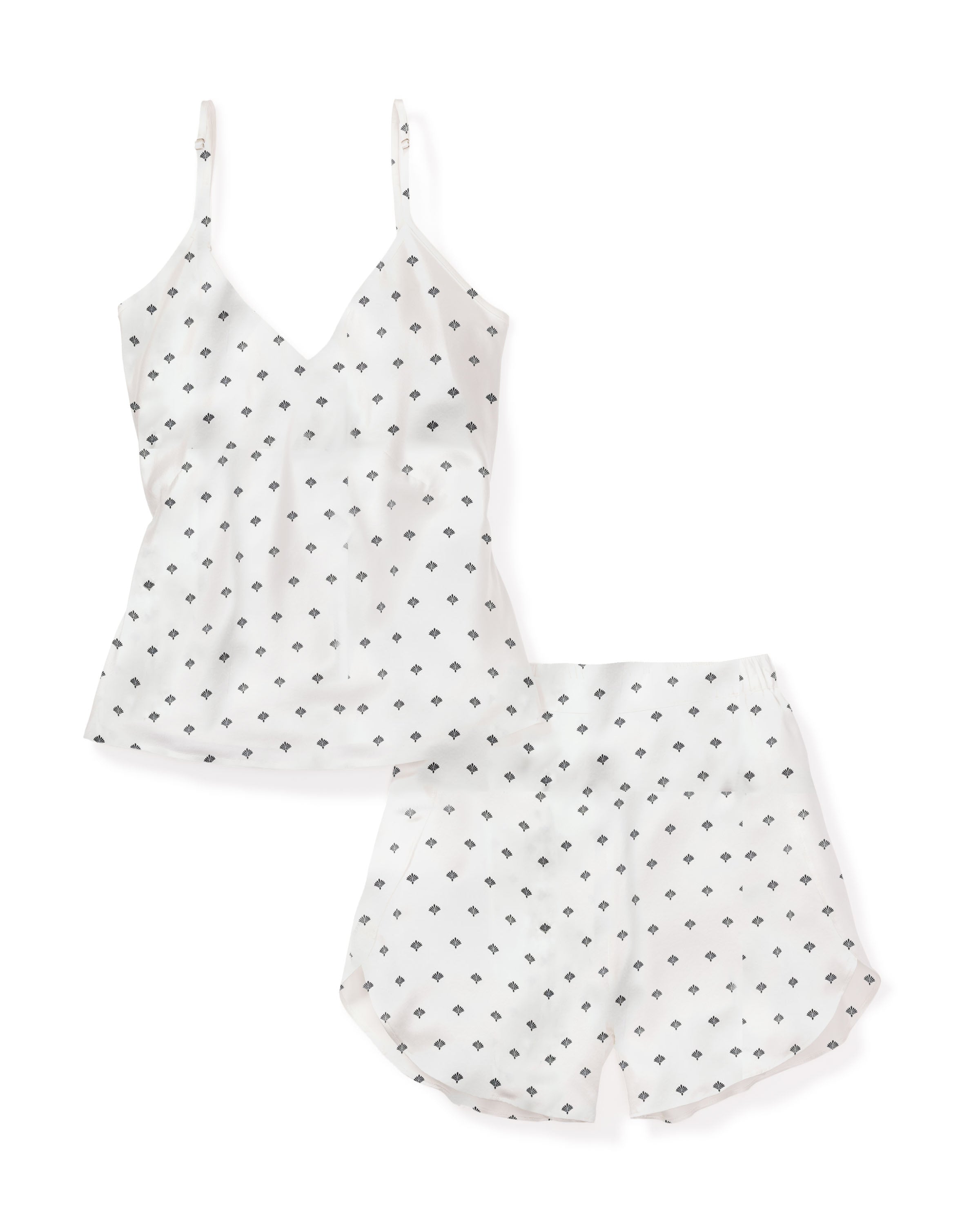 Experience refined luxury sleepwear with Petite Plumes Womens Silk Cami Short Set in White Art Nouveau. This luxurious mulberry silk set includes a V-neck tank top with thin straps and loose-fit shorts, adorned in a unique small repeating black diamond pattern.