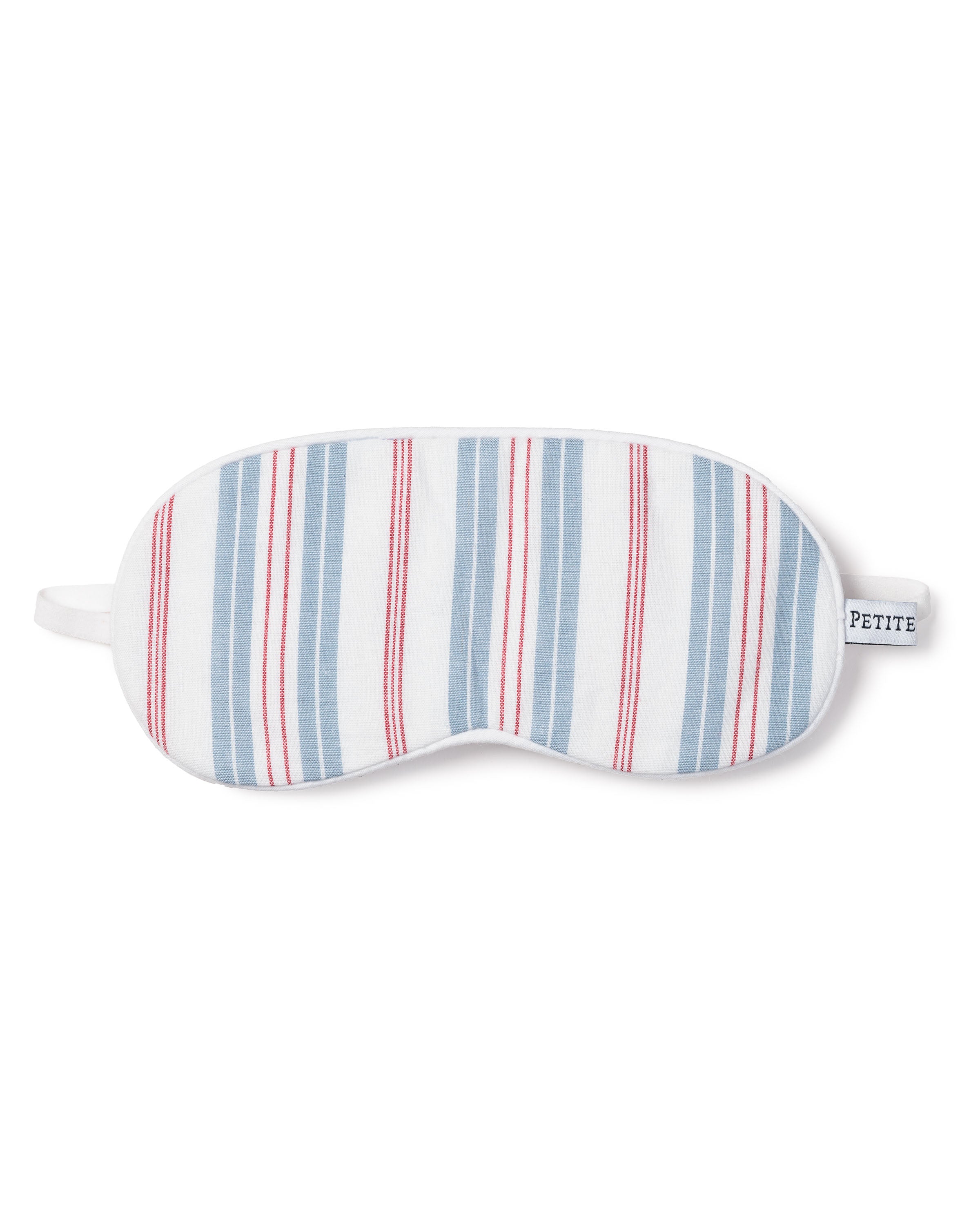The Kids Sleep Mask in Vintage French Stripes by Petite Plume features blue and red vertical stripes on white, offering a timeless charm with its elastic strap and a PETITE tag.