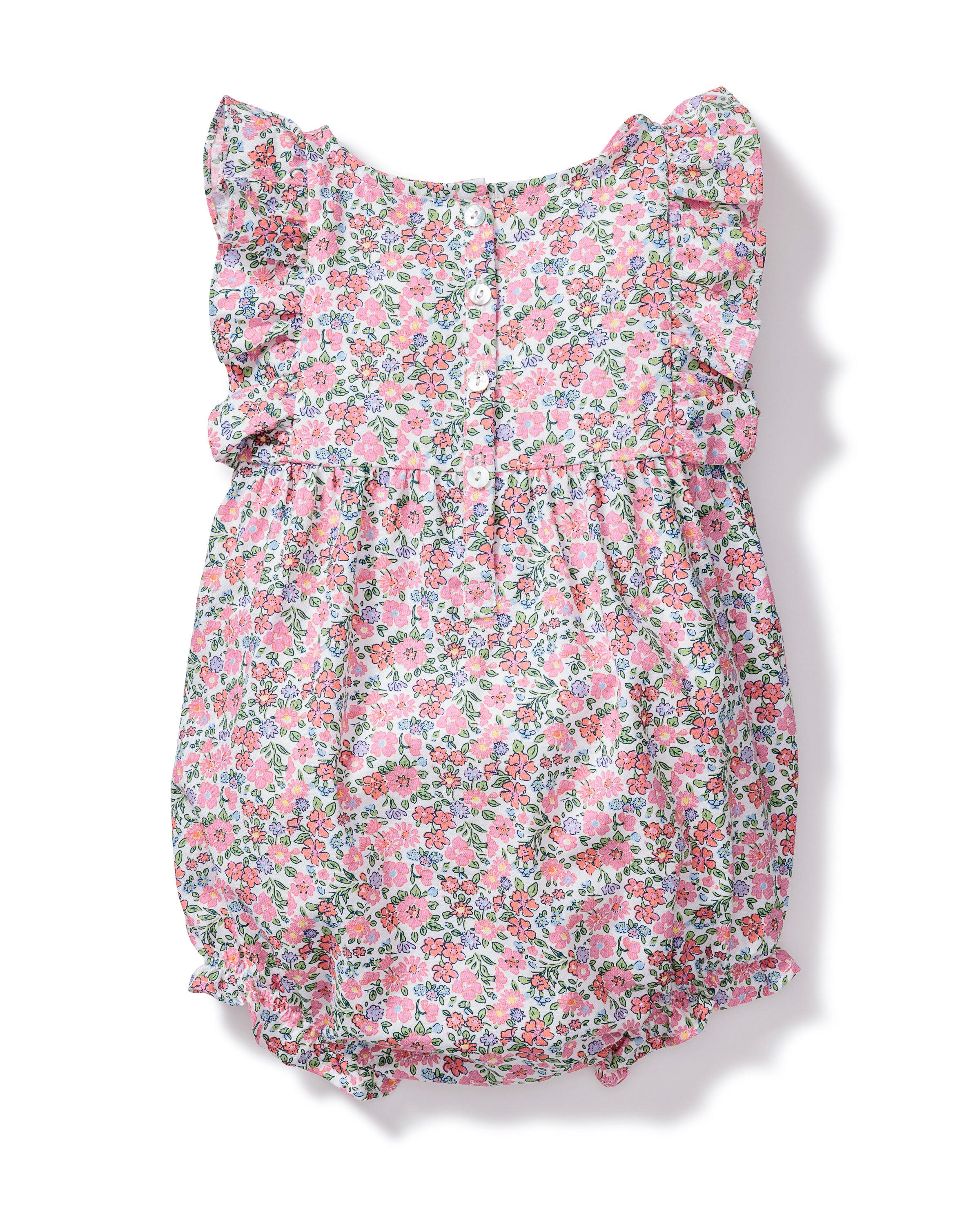 The Petite Plume Babys Twill Ruffled Romper in Fleurs de Rose print features pink, green, and white flowers. It has ruffled sleeves, a gathered waist, and button details on the back. Crafted from high-quality cotton, the lightweight fabric is perfect for warm weather outings.