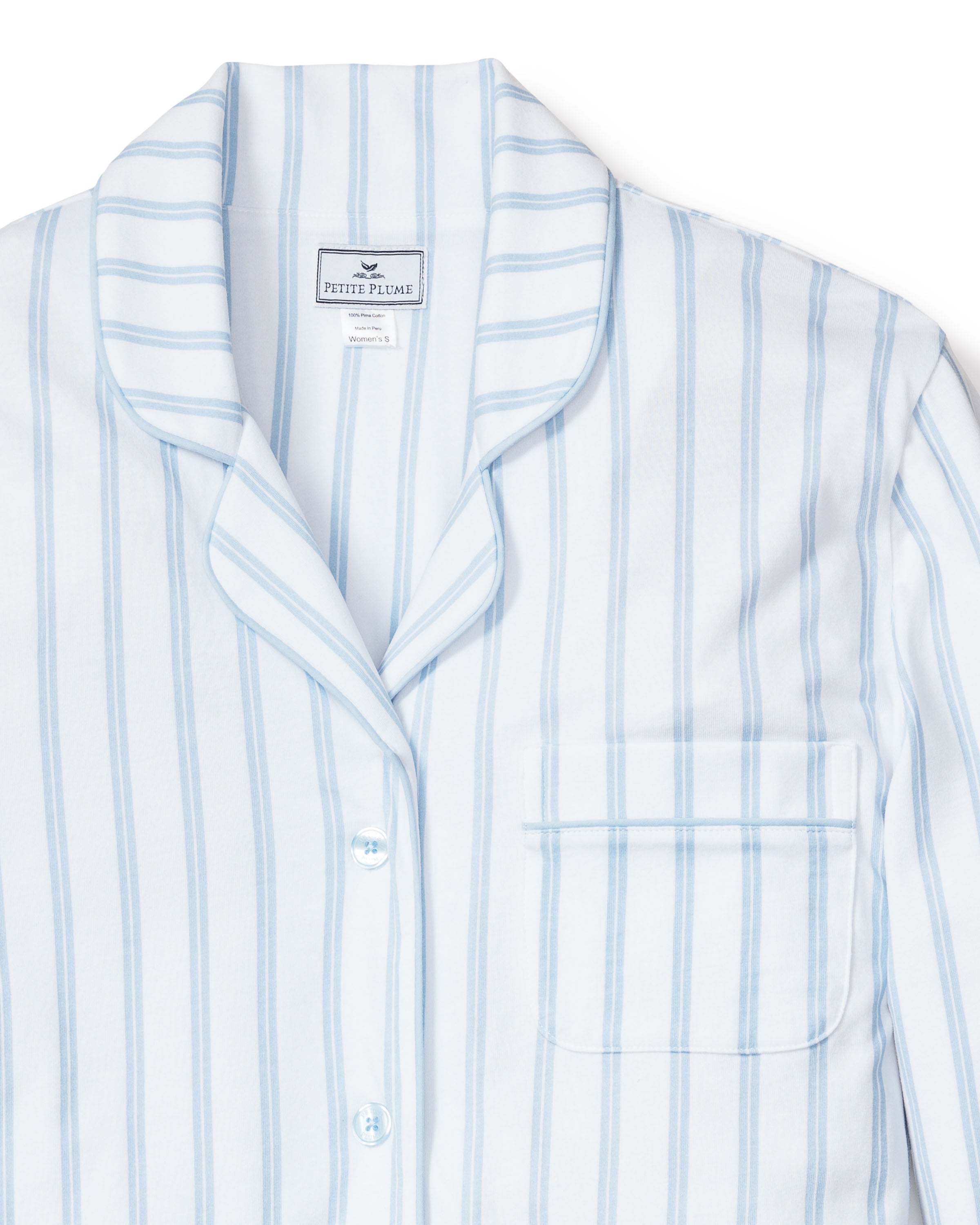 The Womens Pima Nightshirt in Periwinkle and White Stripe by Petite Plume features a notched collar, button-down front, and breast pocket, crafted from luxurious Peruvian Pima cotton for ultimate comfort.