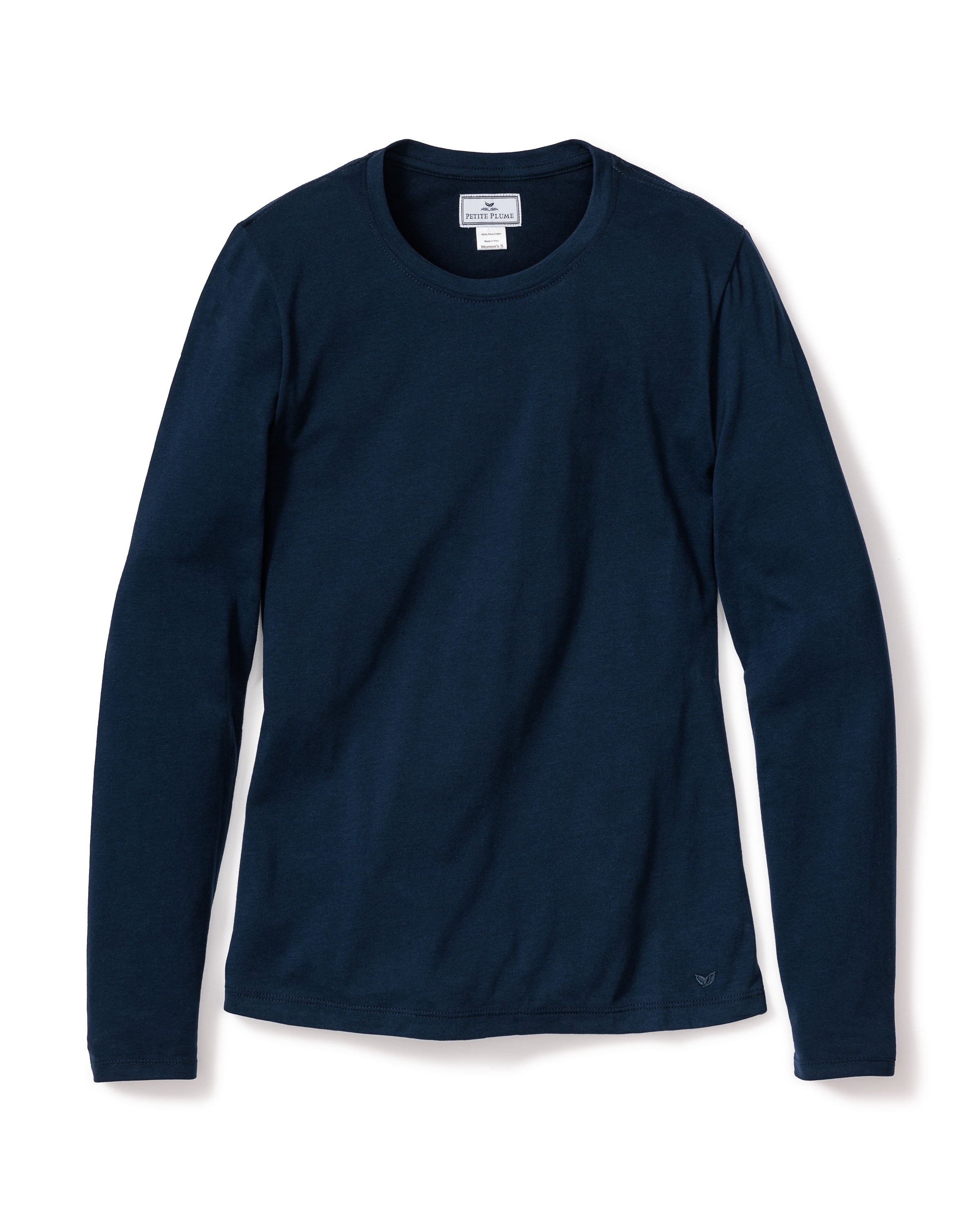 Laid flat is the Womens Pima Long Sleeve Top in Navy by Petite Plume. Made from luxurious Peruvian Pima cotton, it features a simple design without visible logos or patterns. The soft fabric resembles jersey knit pajamas for comfort.