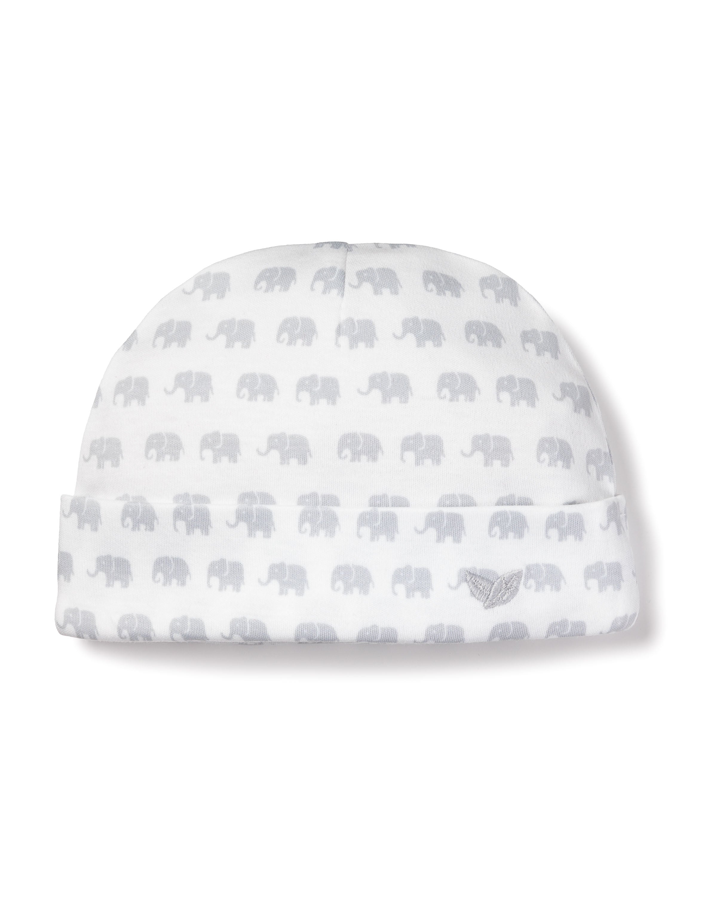 The Babys Pima Hat in Grey Elephants by Petite Plume, made from soft Peruvian Pima Cotton, showcases light gray elephants and a small embroidered emblem on the folded brim, providing a charming and comfortable finish to any baby outfit.