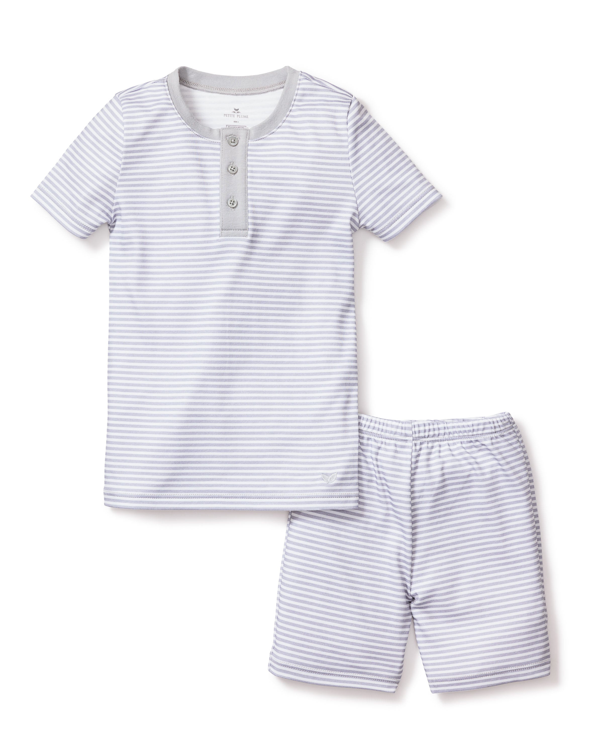 The Kids Pima Snug Fit Pajama Short Set in Grey Stripes by Petite Plume is crafted from soft Pima cotton and features a snug fit. It includes a light gray and white striped pattern, a top with a round neck and two buttons, and shorts with an elastic waistband.
