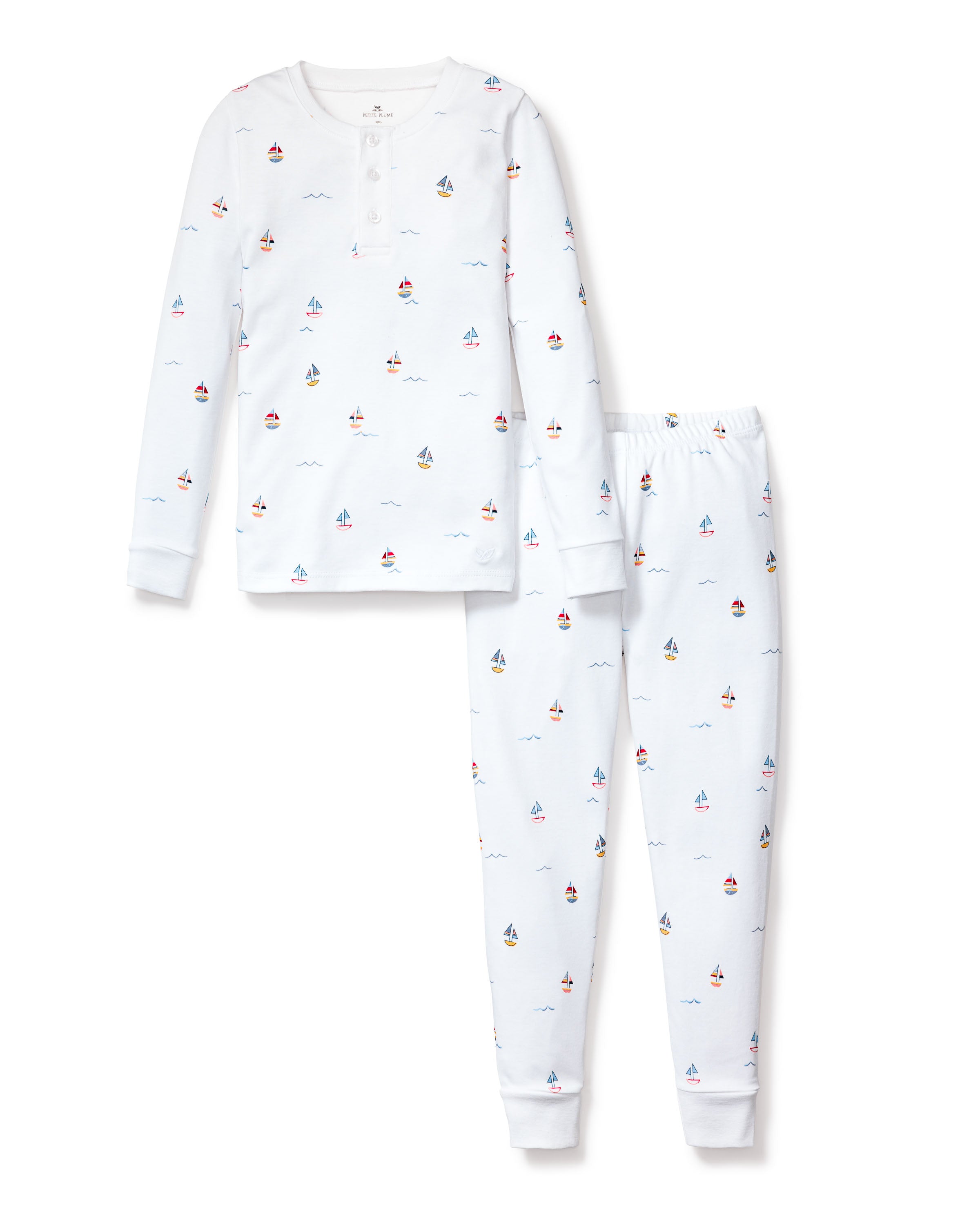 The Petite Plume Kids Pima Snug Fit Pajama Set in Bateau features soft Pima cotton and a nautical sailboat print. The long-sleeve top has a round neckline with buttons, making these pajamas perfect for cozy nights.