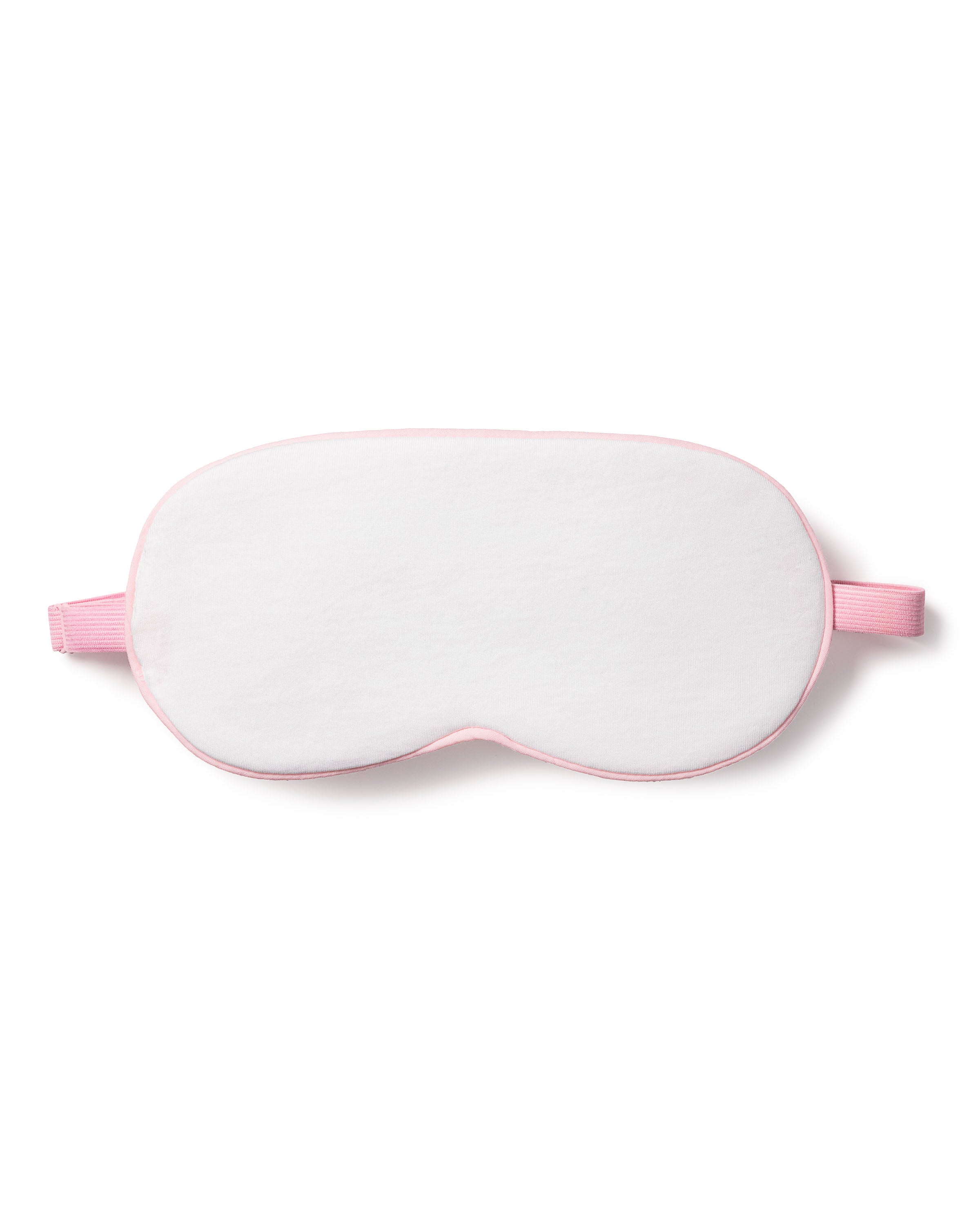 The Petite Plume Adults Pima Sleep Mask in White with Pink Piping is made of 100% Pima Cotton and includes a comfy pink elastic strap. It can be monogrammed for a personalized touch and pairs perfectly with matching eye masks for your relaxation set.