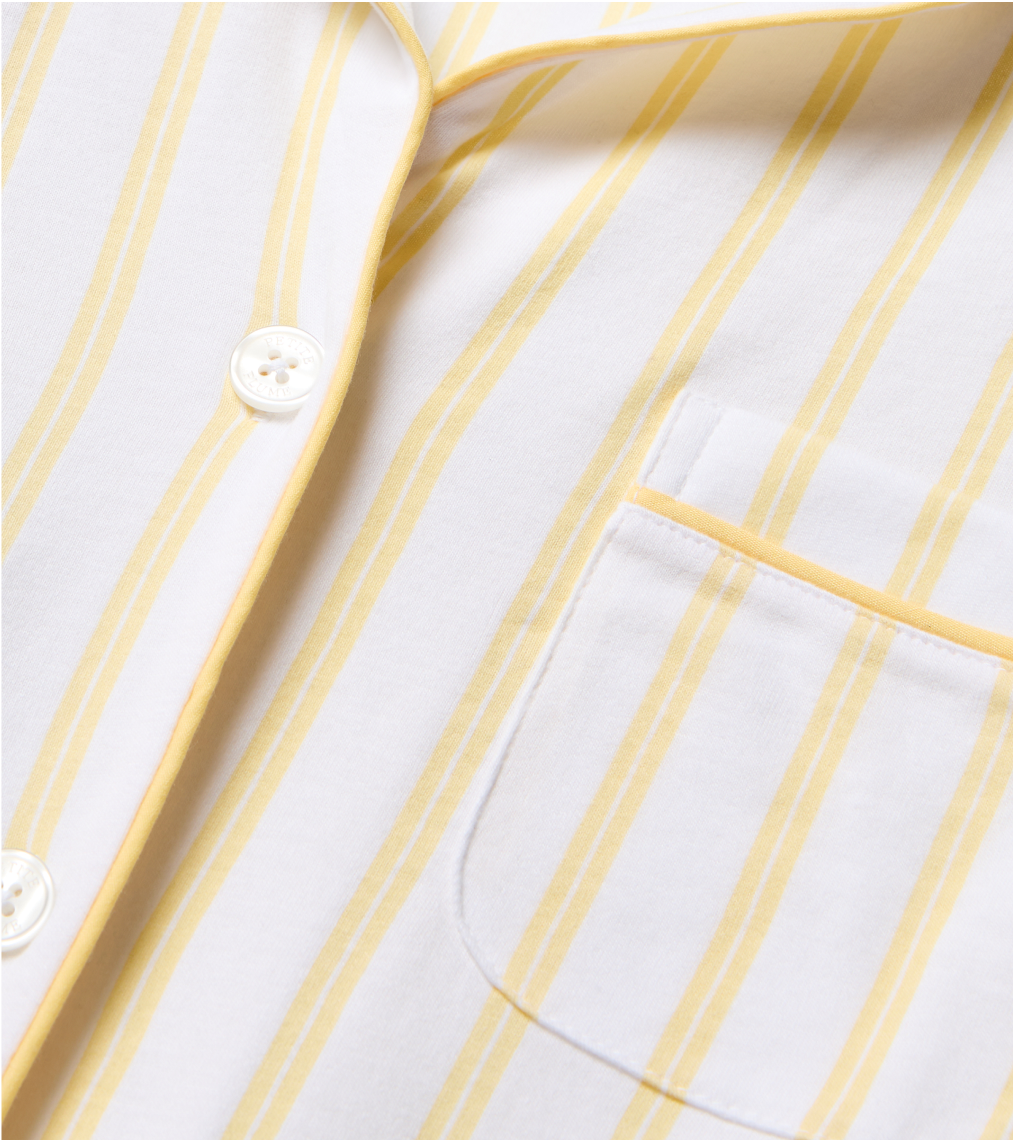 Close up of Yellow and White stripe pajama top