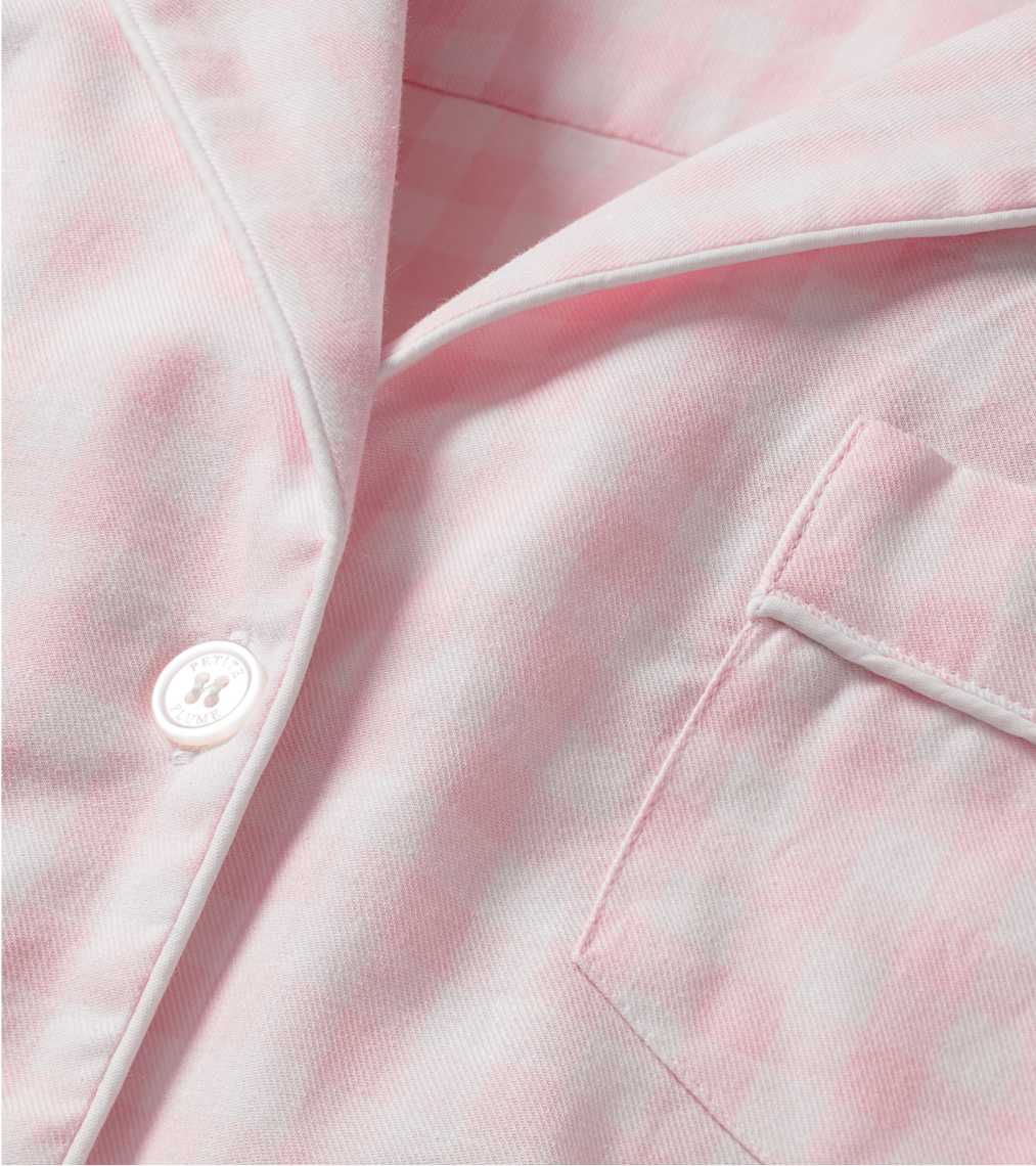 Close up of pink and white gingham pajama top