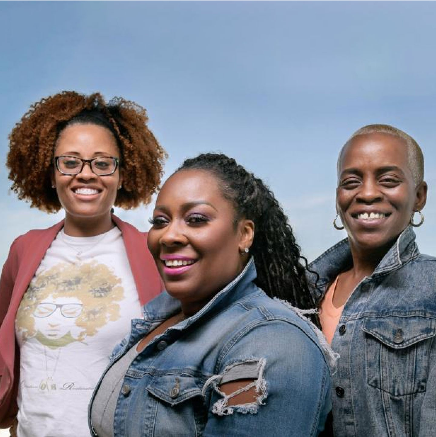 3 Women smiling together