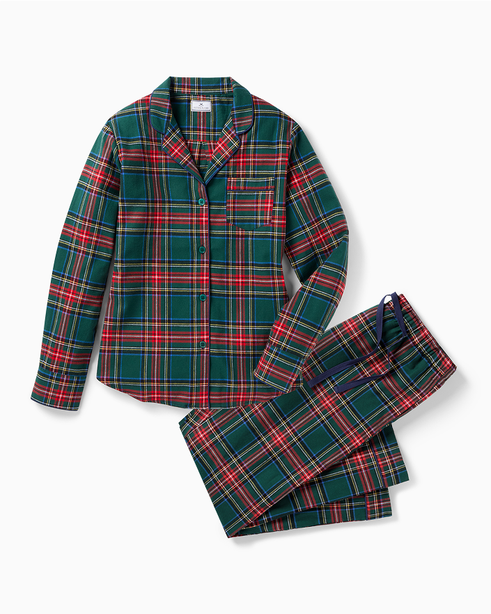 A set of classic plaid pajamas with a button-up long-sleeve top and matching pants, featuring a green, red, and white tartan pattern.