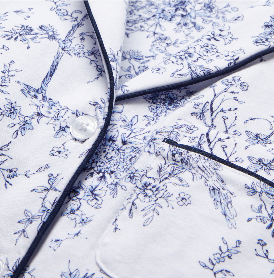 Close up with Navy flowers on white pajama top
