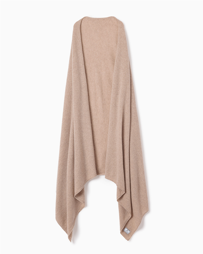 A light brown, open-front poncho-style shawl with draped, asymmetrical edges, displayed on a plain white background.