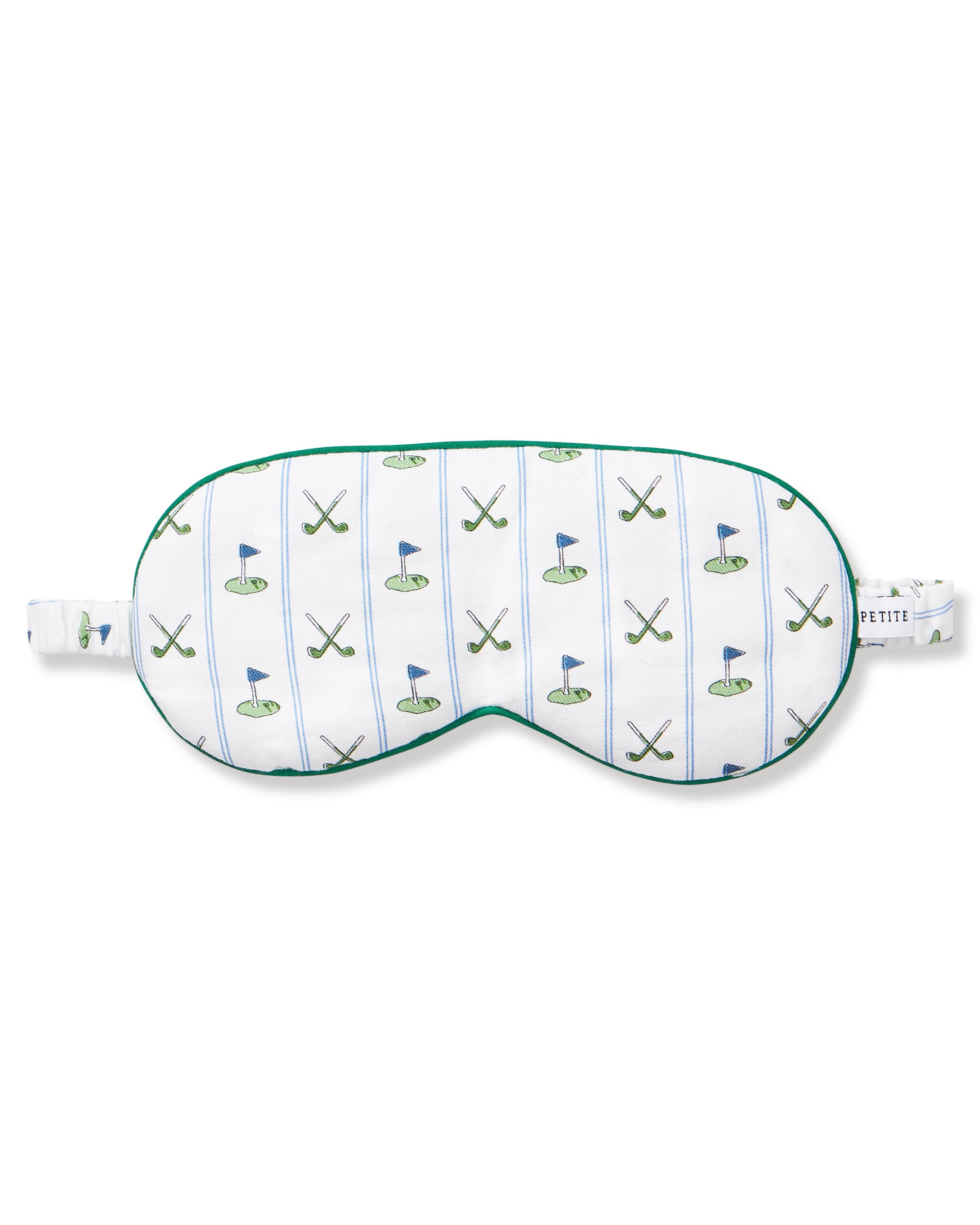 The Adult's Pima Sleep Mask in Fairway Stripe is a white sleep mask with green trim, decorated with golf clubs, balls, and putting greens. It features an adjustable strap and a small side tag.