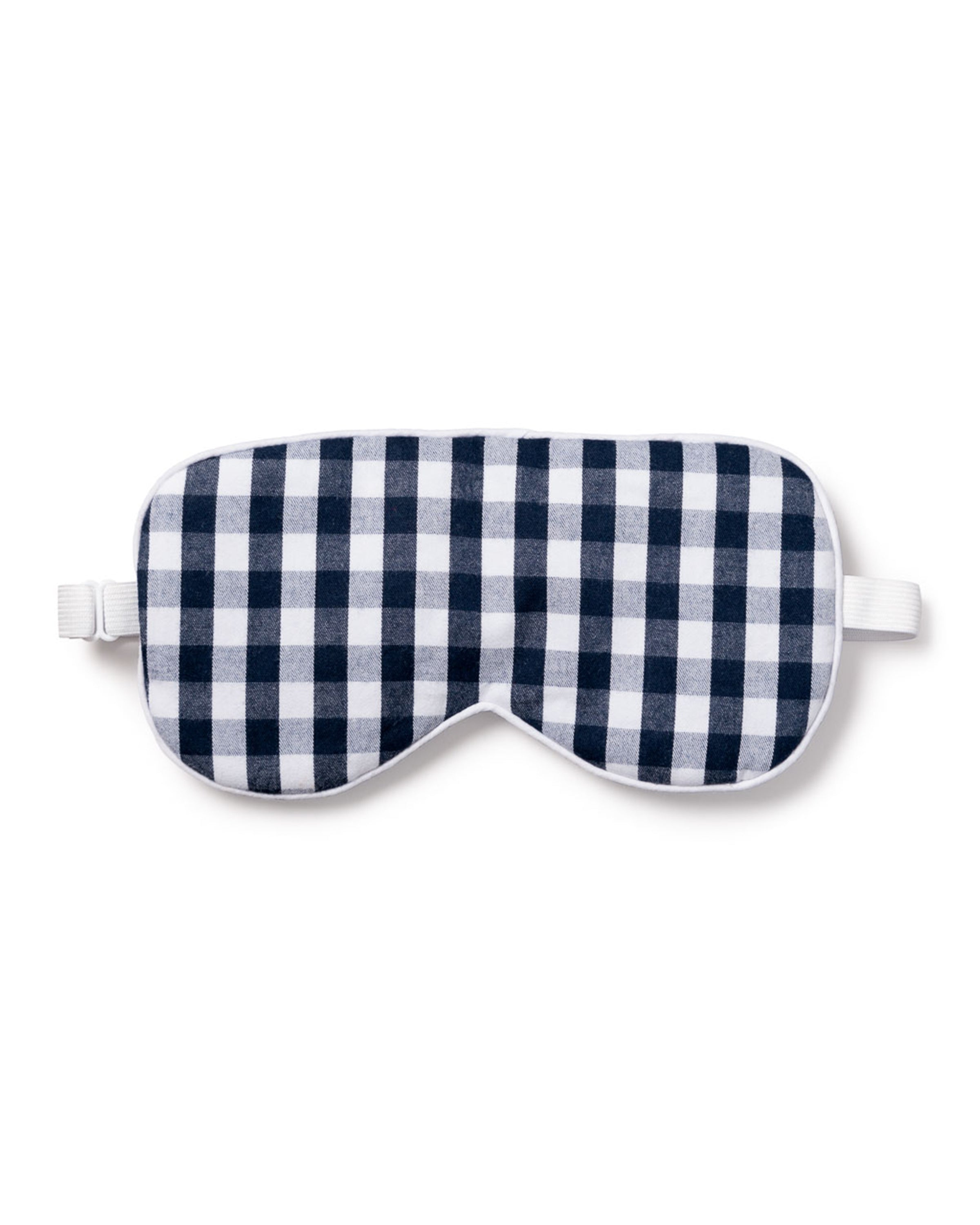 Indulge in luxurious sleep with Petite Plumes Adults Twill Sleep Mask in Navy Gingham, complete with elastic straps for comfort. Opt for monogramming to create a unique personal touch.