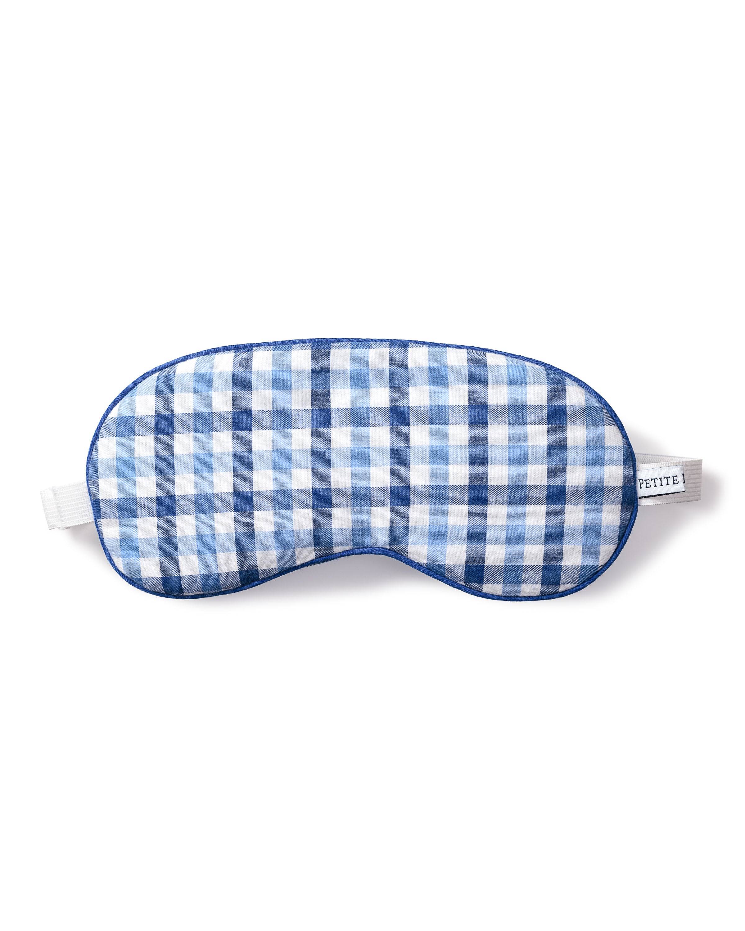 A delightful gift option, the Petite Plume Adults Twill Sleep Mask in Royal Blue Gingham features a charming checkered pattern with a comfortable white elastic strap.