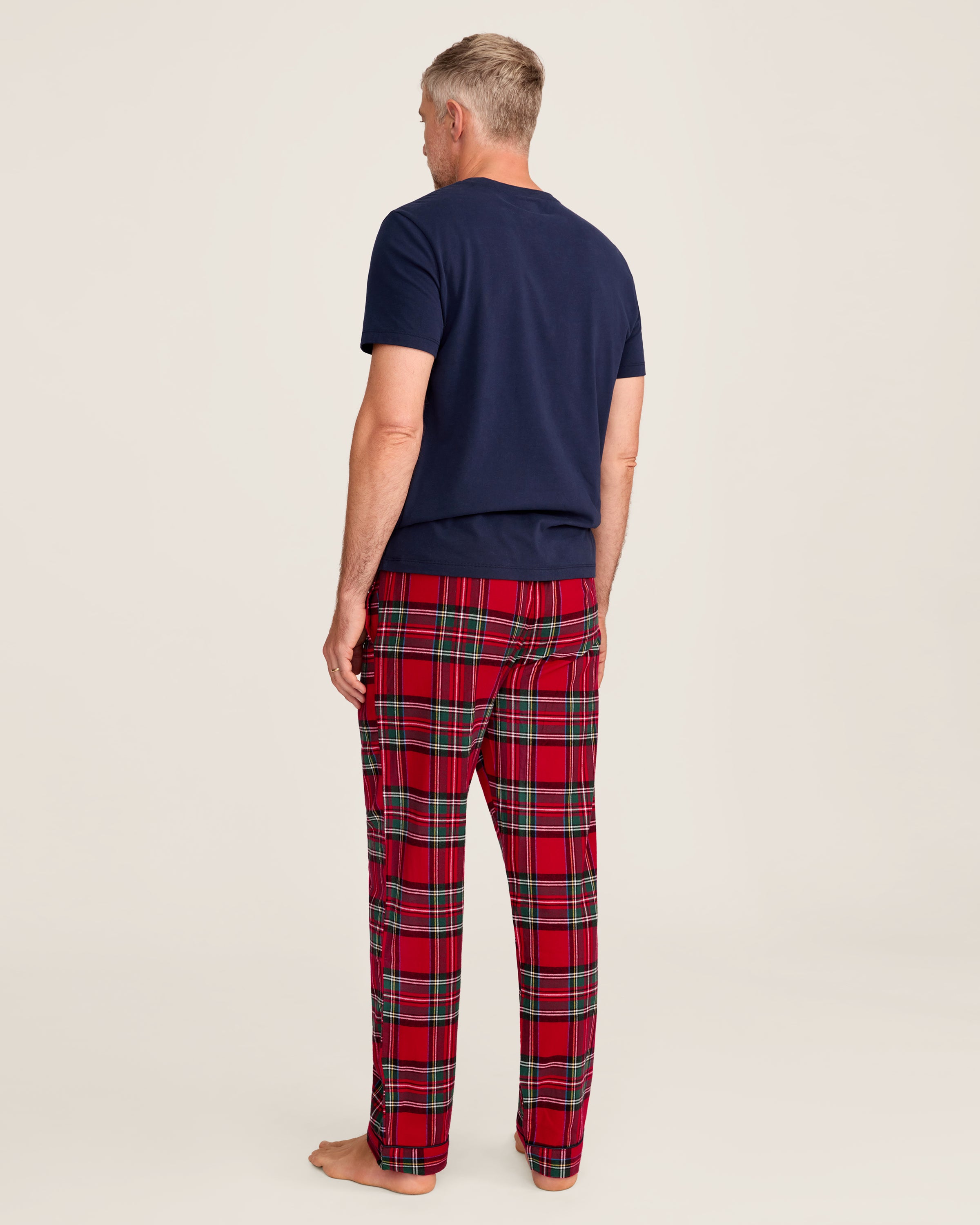Men's Brushed Twill Pajama Pant in Imperial Tartan, featuring a red plaid pattern with green, white, and black lines, an elastic waistband, and a black drawstring, shown flat on a white background.