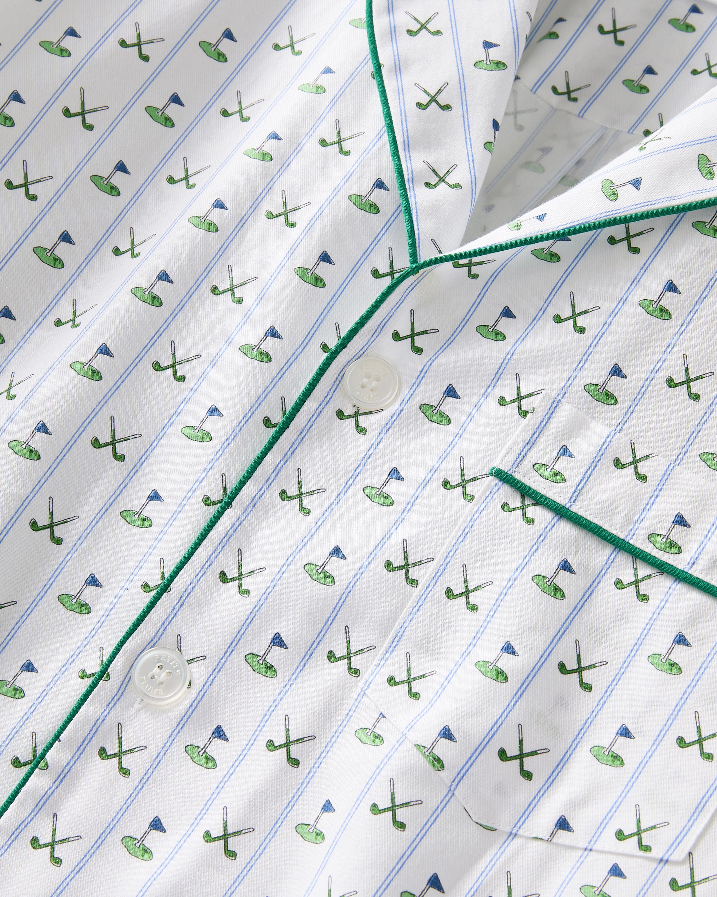 Men's Twill Pajama Set in Fairway Stripe, featuring a small green anchor pattern, green piping, chest pocket, and elastic waistband with green drawstring pants. The set is displayed neatly on a white background.