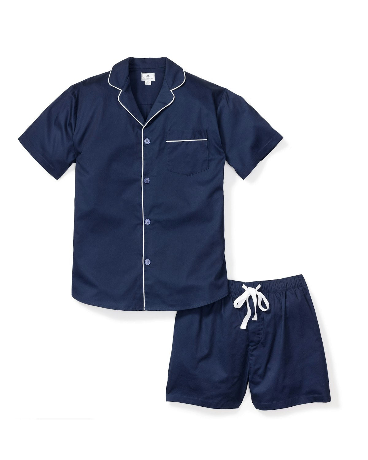 Indulge in luxury with Petite Plumes Mens Twill Pajama Short Set in Navy. This 100% cotton set includes a short-sleeve button-up top with white piping and a chest pocket, paired with matching drawstring shorts for ultimate comfort.