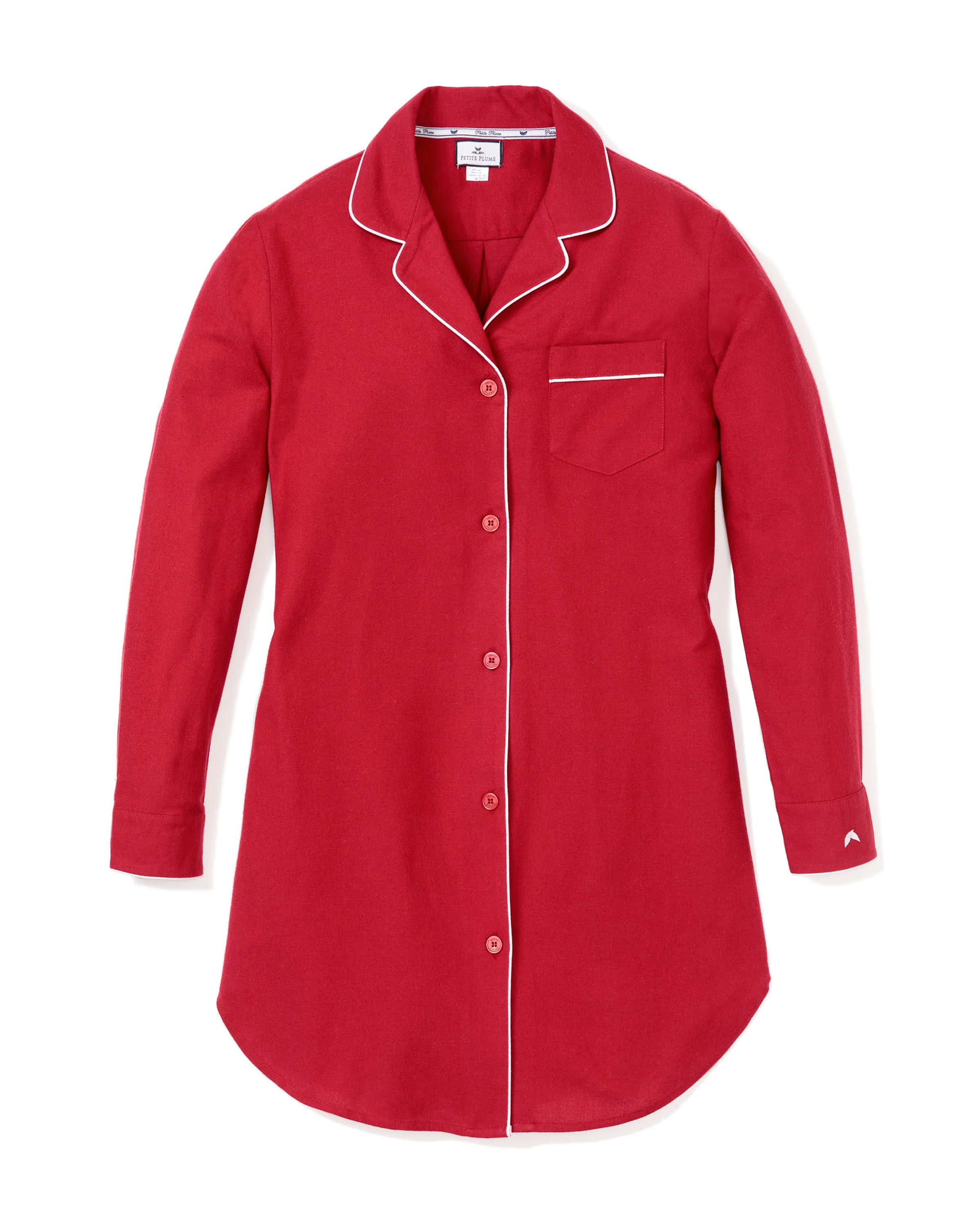 The Womens Flannel Nightshirt in Red by Petite Plume features white piping on the collar, pocket, and sleeve cuffs. This soft flannel sleepwear includes a left-side pocket and rounded hem for enhanced comfort.