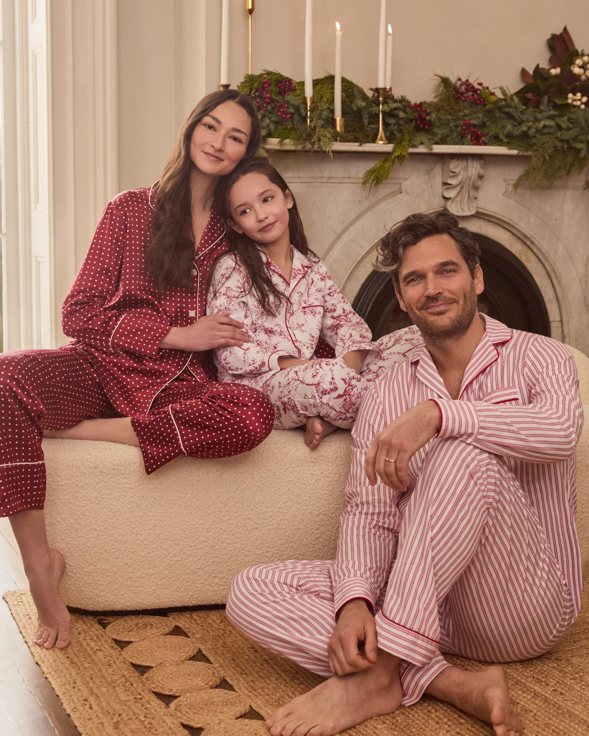 Experience luxury sleepwear with Petite Plumes Womens Silk Pajama Set in Bordeaux Polka Dot, featuring a bright red button-up long-sleeve top with white dots and piping, crafted from breathable mulberry silk, paired with matching pants.