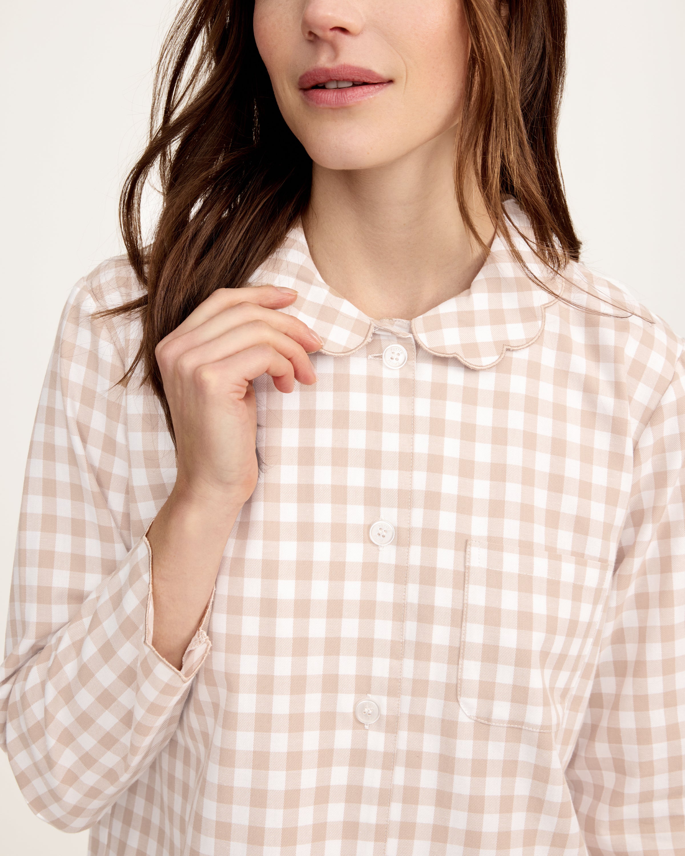 Women's Twill Colette Pajama Set in Camel Gingham, featuring a long-sleeve button-up top with a scalloped collar and matching long pants, shown laid flat on a white background.