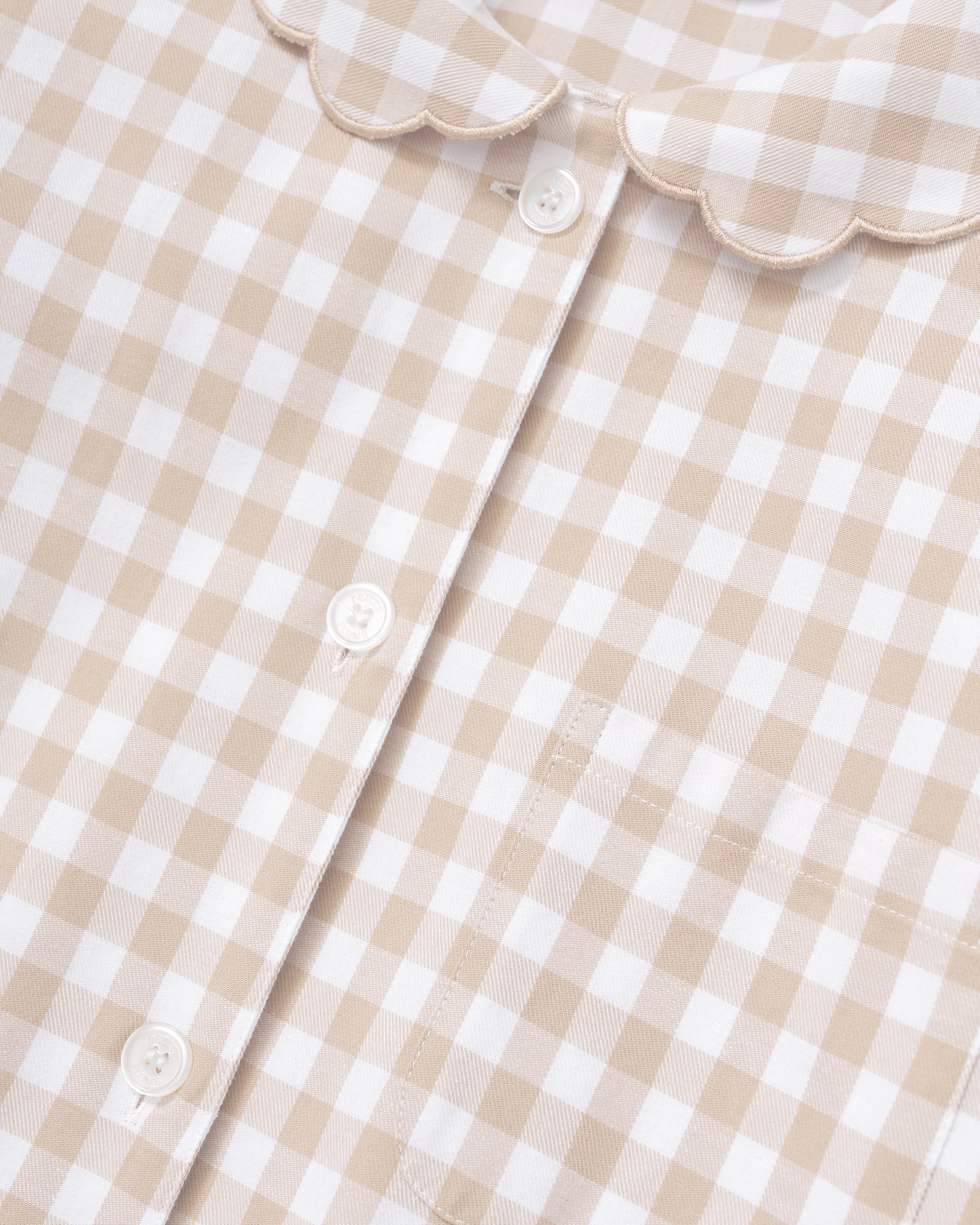 Women's Twill Colette Pajama Set in Camel Gingham, featuring a long-sleeve button-up top with a scalloped collar and matching long pants, shown laid flat on a white background.