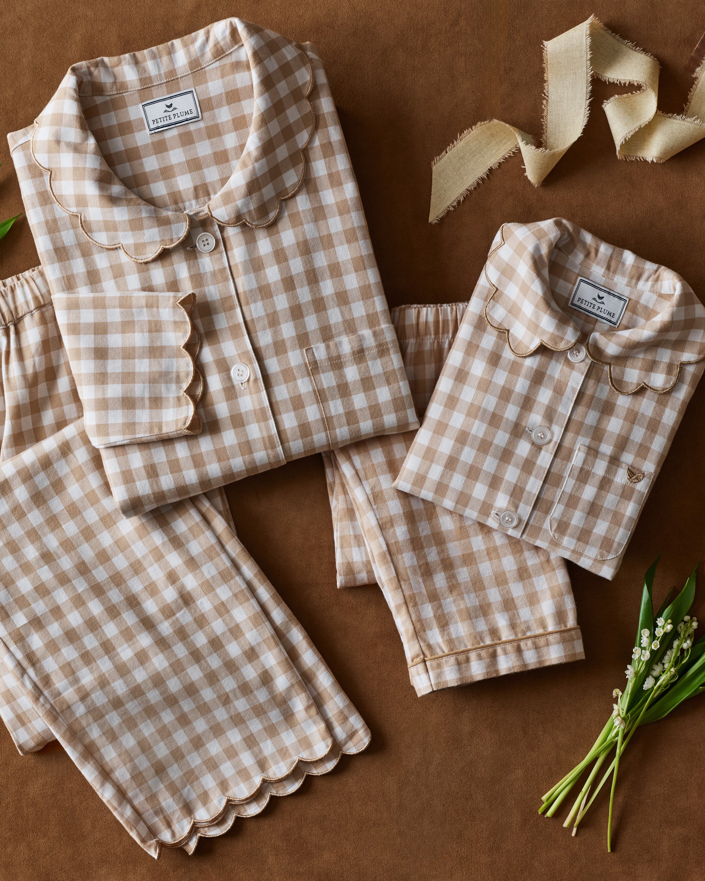 Women's Twill Colette Pajama Set in Camel Gingham, featuring a long-sleeve button-up top with a scalloped collar and matching long pants, shown laid flat on a white background.