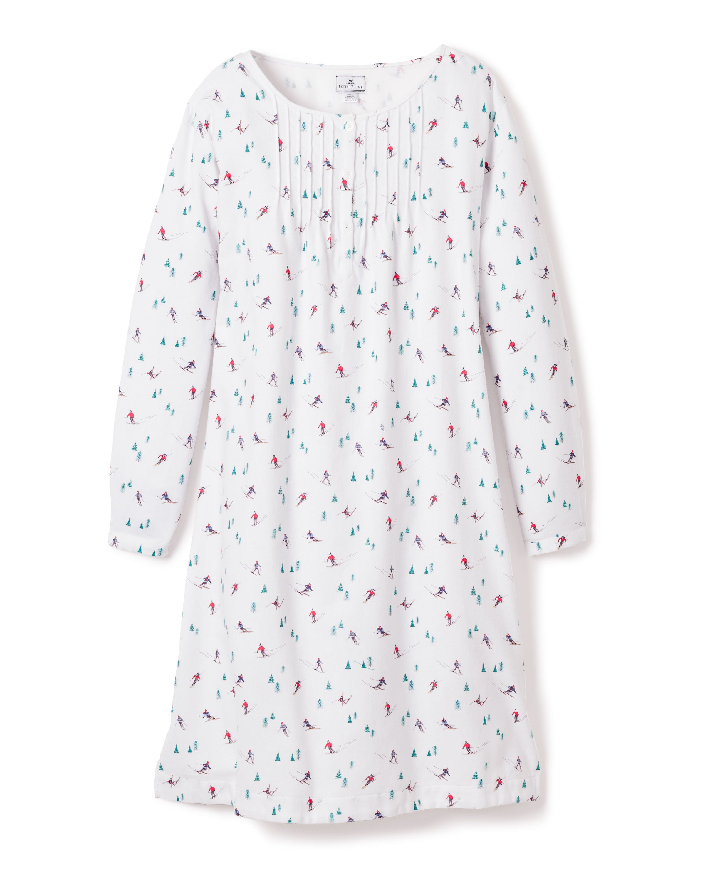 Indulge in luxury sleepwear with the Womens Flannel Beatrice Nightgown by Petite Plume. This white long-sleeve gown features a pleated neckline and a delightful print of tiny colorful trees and skiers, perfect for cozy evenings.