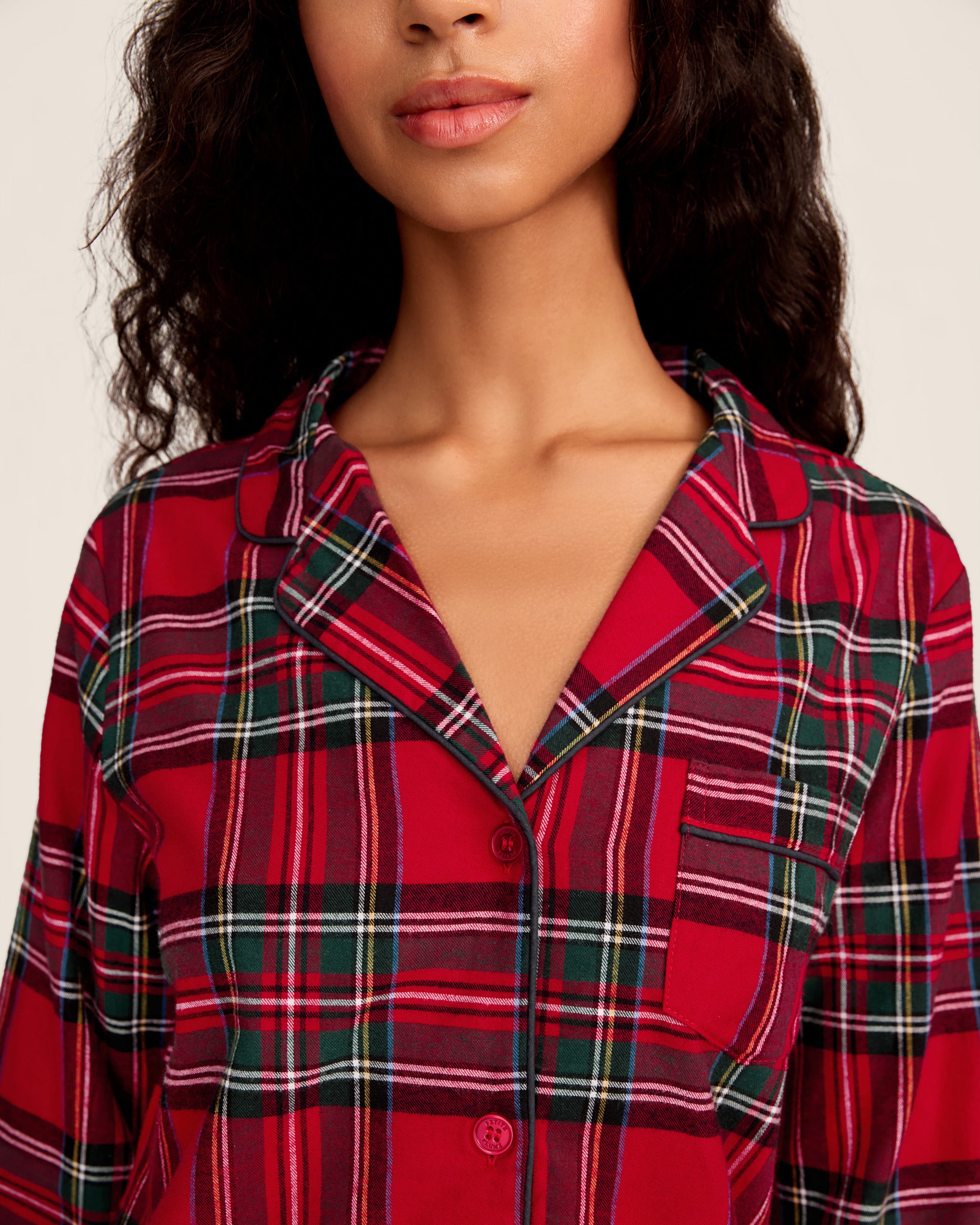 Women's Brushed Twill Pajama Set in Imperial Tartan features a red plaid button-up top with chest pocket and matching pants with a drawstring waist, detailed in green, white, and navy stripes for a classic look.