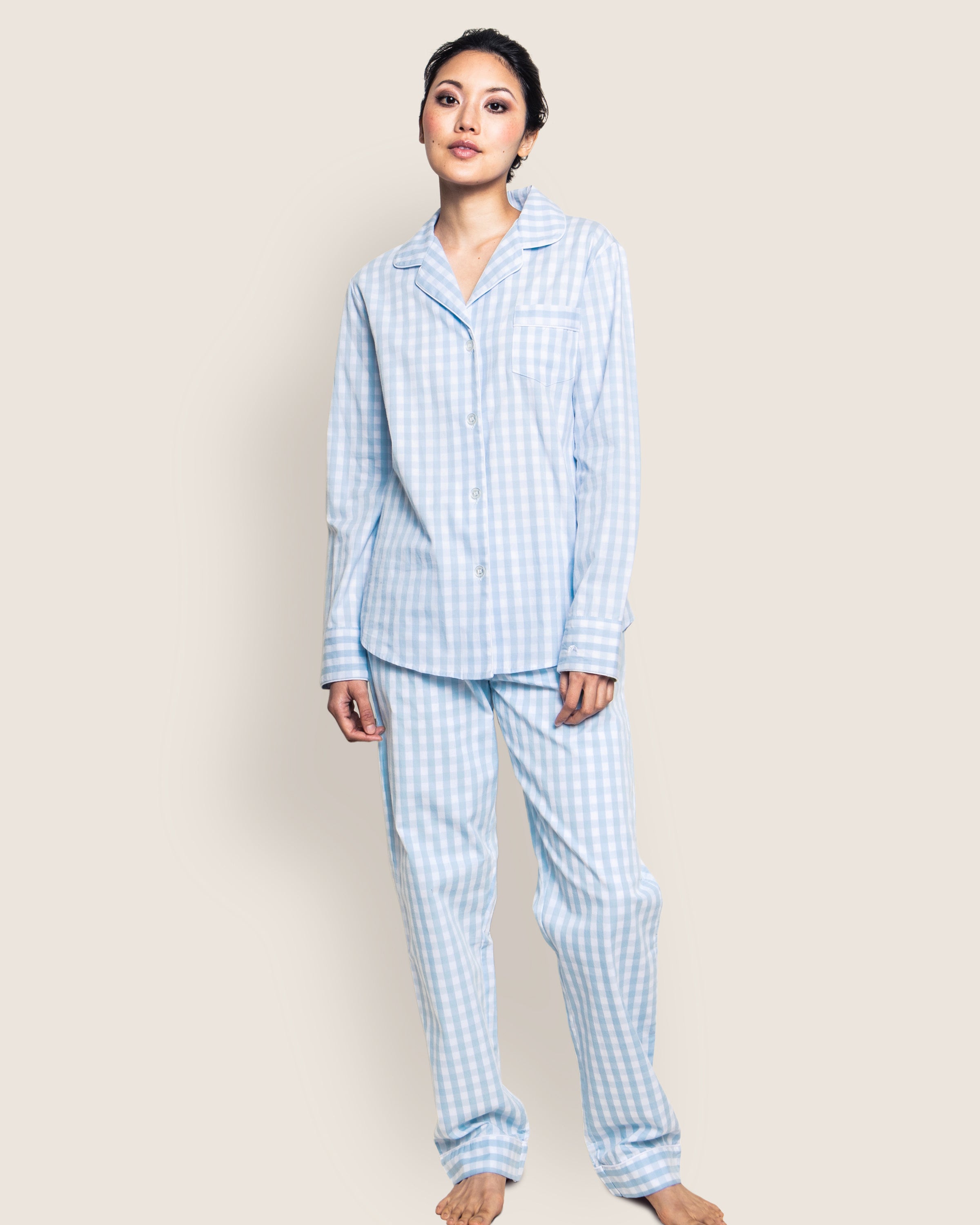 Close-up of Petite Plumes Womens Twill Pajama Set in Light Blue Gingham fabric featuring an elastic waistband and a white, textured drawstring tied in a bow at the front.