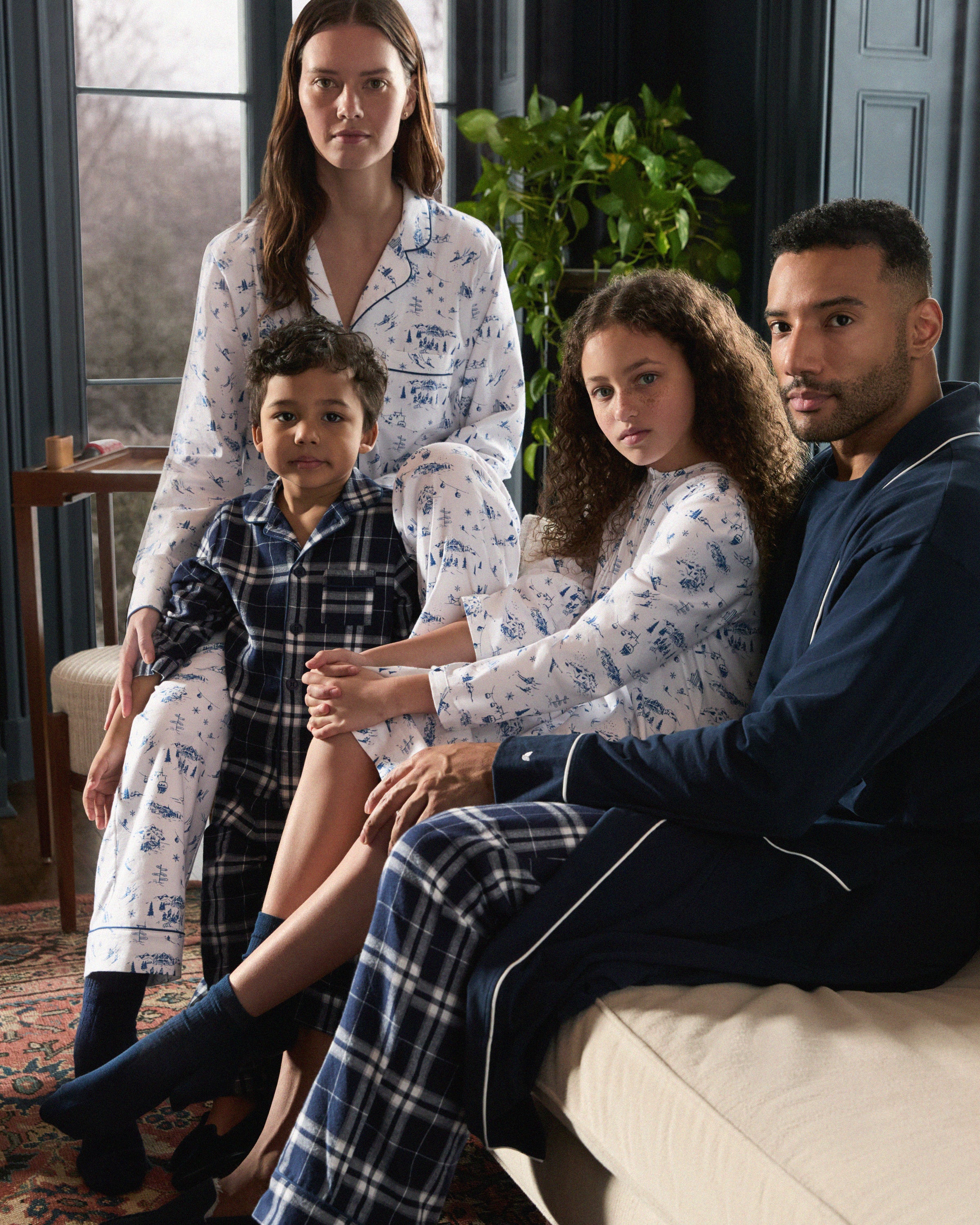 Women's Twill Pajama Set in Chalet Toile, featuring a white long-sleeve button-up shirt and matching pants with blue piping and a blue toile pattern, neatly displayed on a white background.