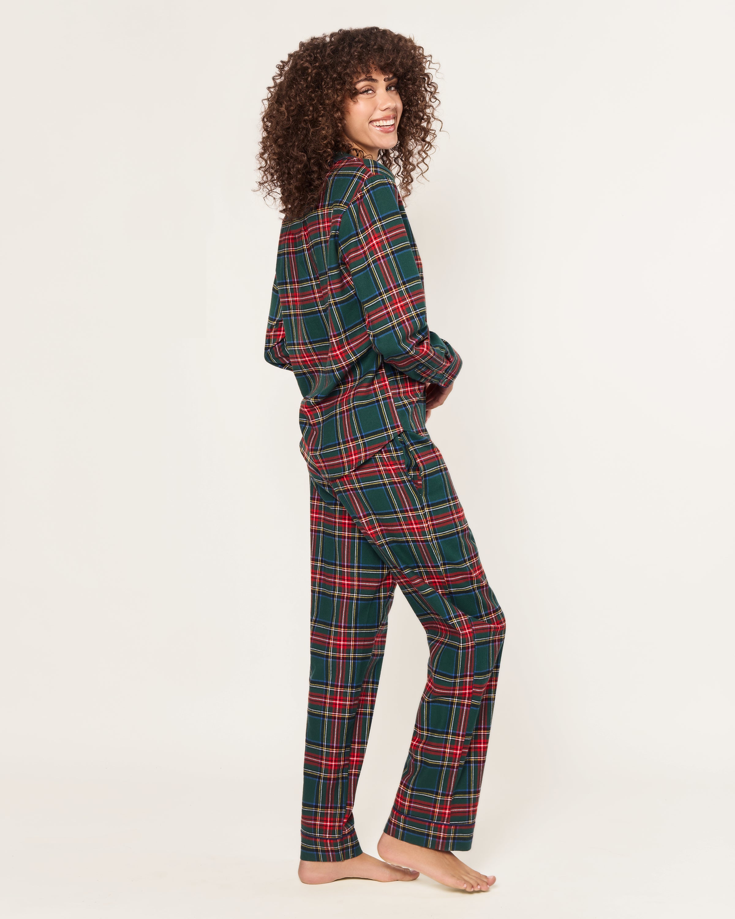 The Women's Brushed Twill Pajama Set in Kensington Tartan features a cozy green, red, and white plaid with a long-sleeve button-up top with chest pocket and matching elastic-waist pants.