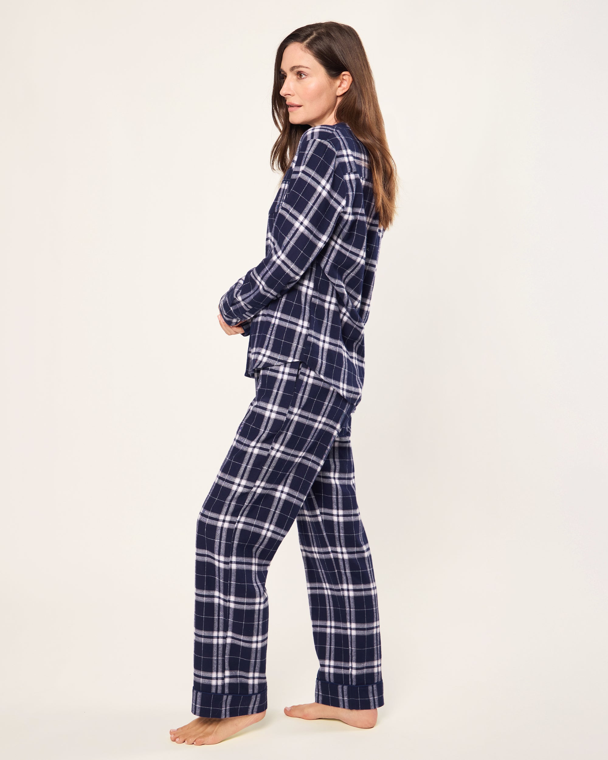 The Women's Brushed Twill Pajama Set in Oxford Tartan features a blue and white plaid long-sleeve button-up shirt with a chest pocket and matching drawstring pants, all displayed on a white background.