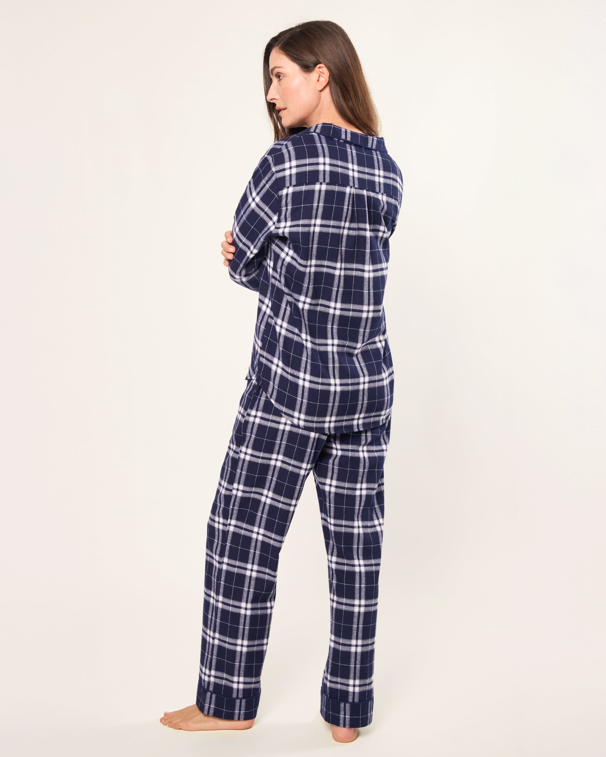 The Women's Brushed Twill Pajama Set in Oxford Tartan features a blue and white plaid long-sleeve button-up shirt with a chest pocket and matching drawstring pants, all displayed on a white background.