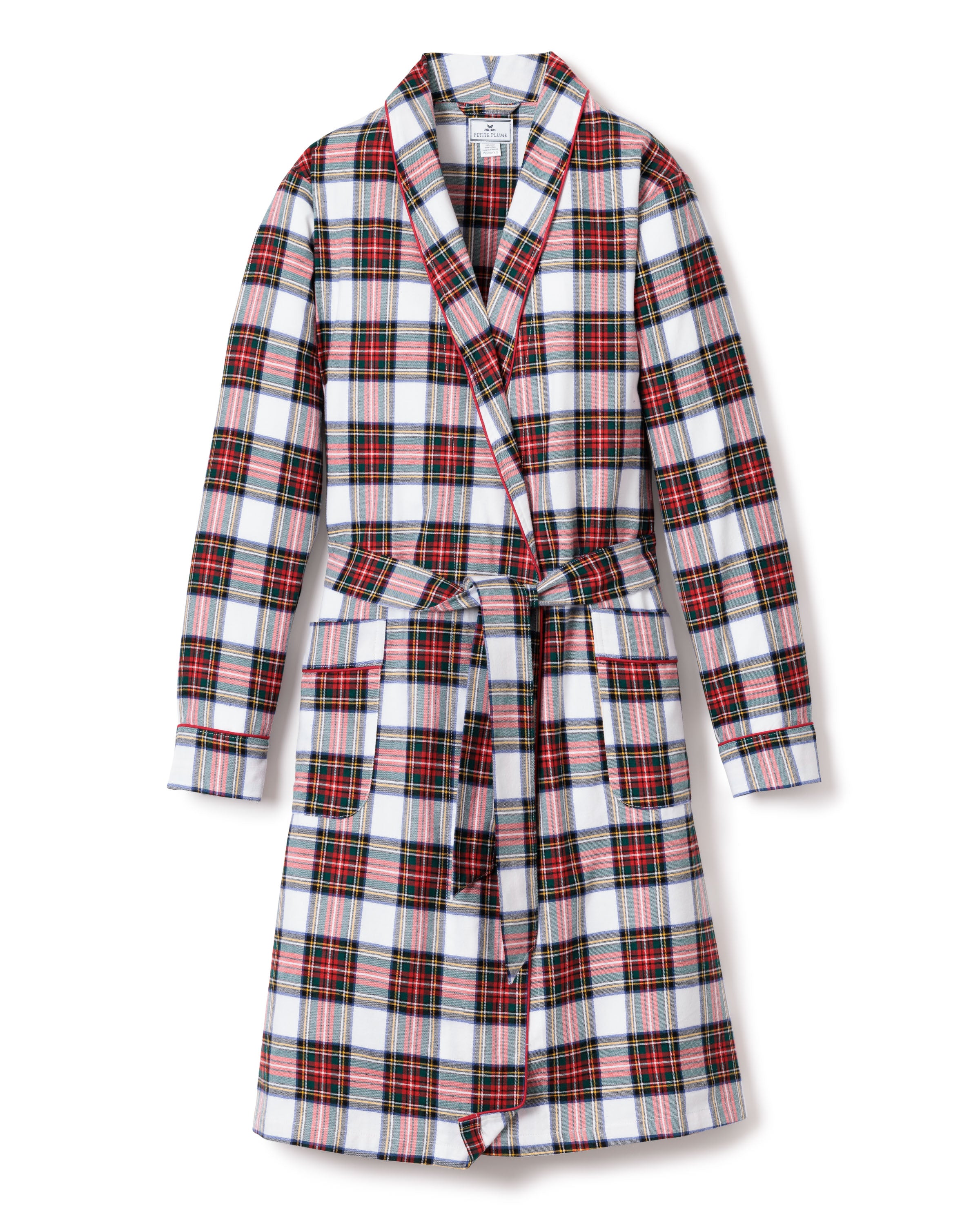 The Womens Brushed Cotton Robe in Balmoral Tartan by Petite Plume is a luxurious plaid bathrobe with a red, white, and black tartan design. It features a shawl collar, tie belt at the waist, and two front pockets for convenience.