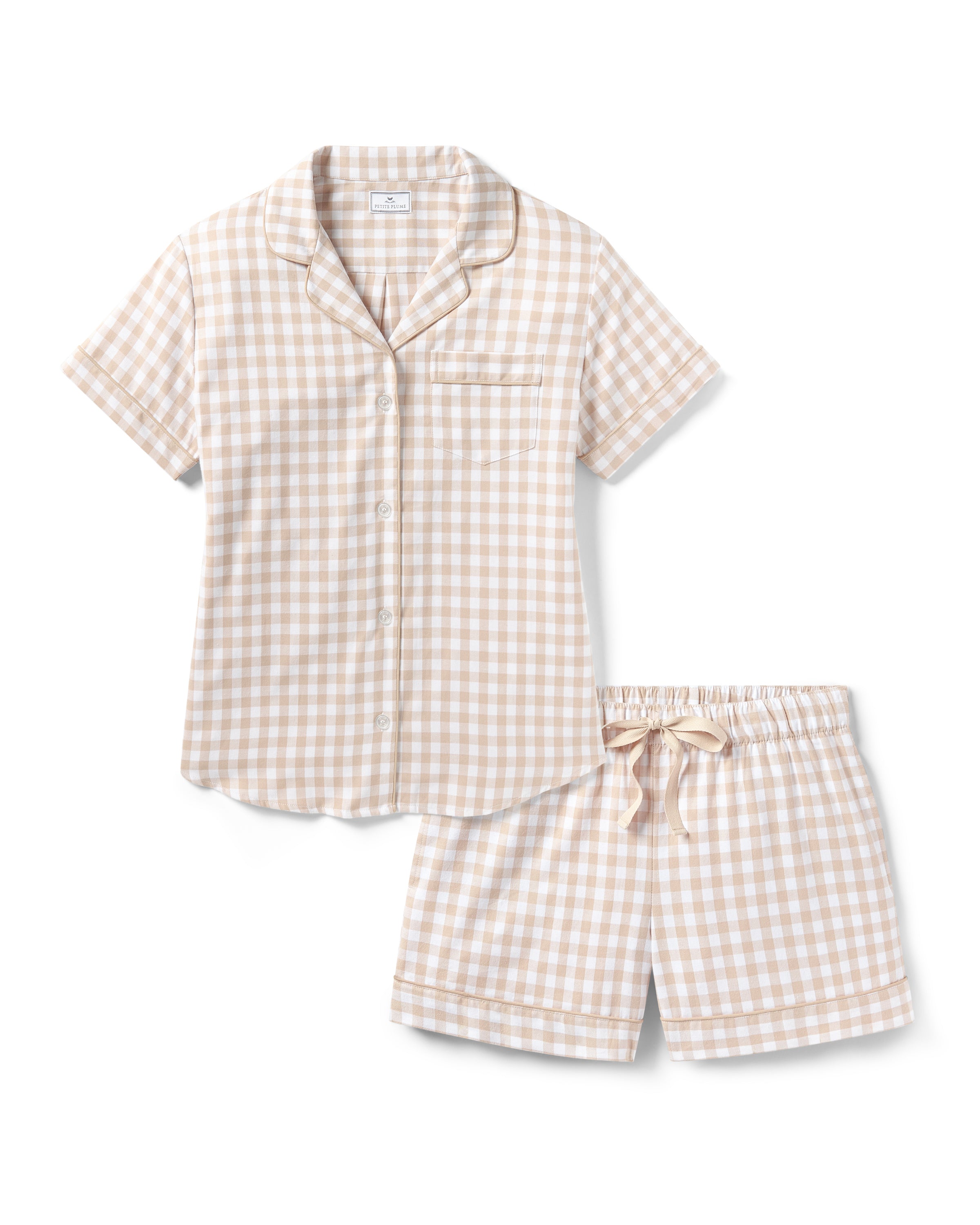 The Women's Twill Short Sleeve Short Set in Camel Gingham features a button-up shirt and matching drawstring shorts with a beige and white gingham pattern.