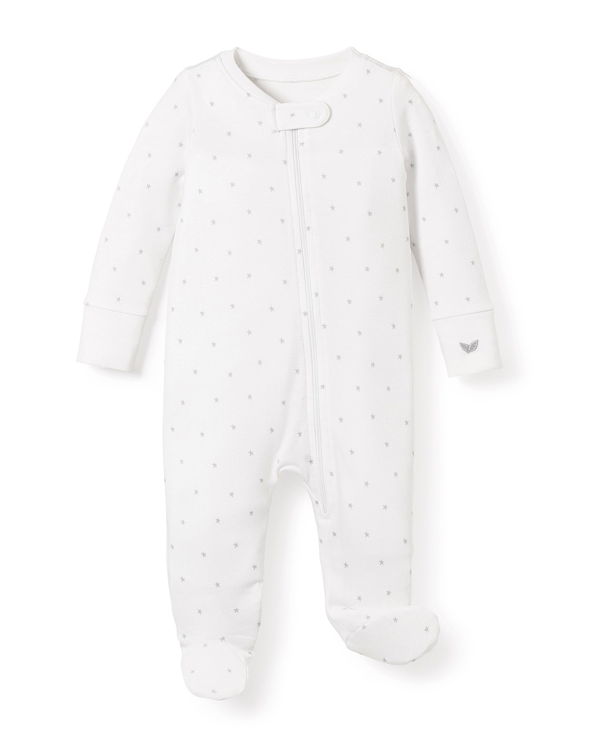 Petite Plumes Babys Pima Romper in Grey Stars features a soft Pima cotton fabric with tiny gray stars, long sleeves, and footed legs. It includes a front snap closure and a small tag logo on the sleeve, all set against a plain white background.