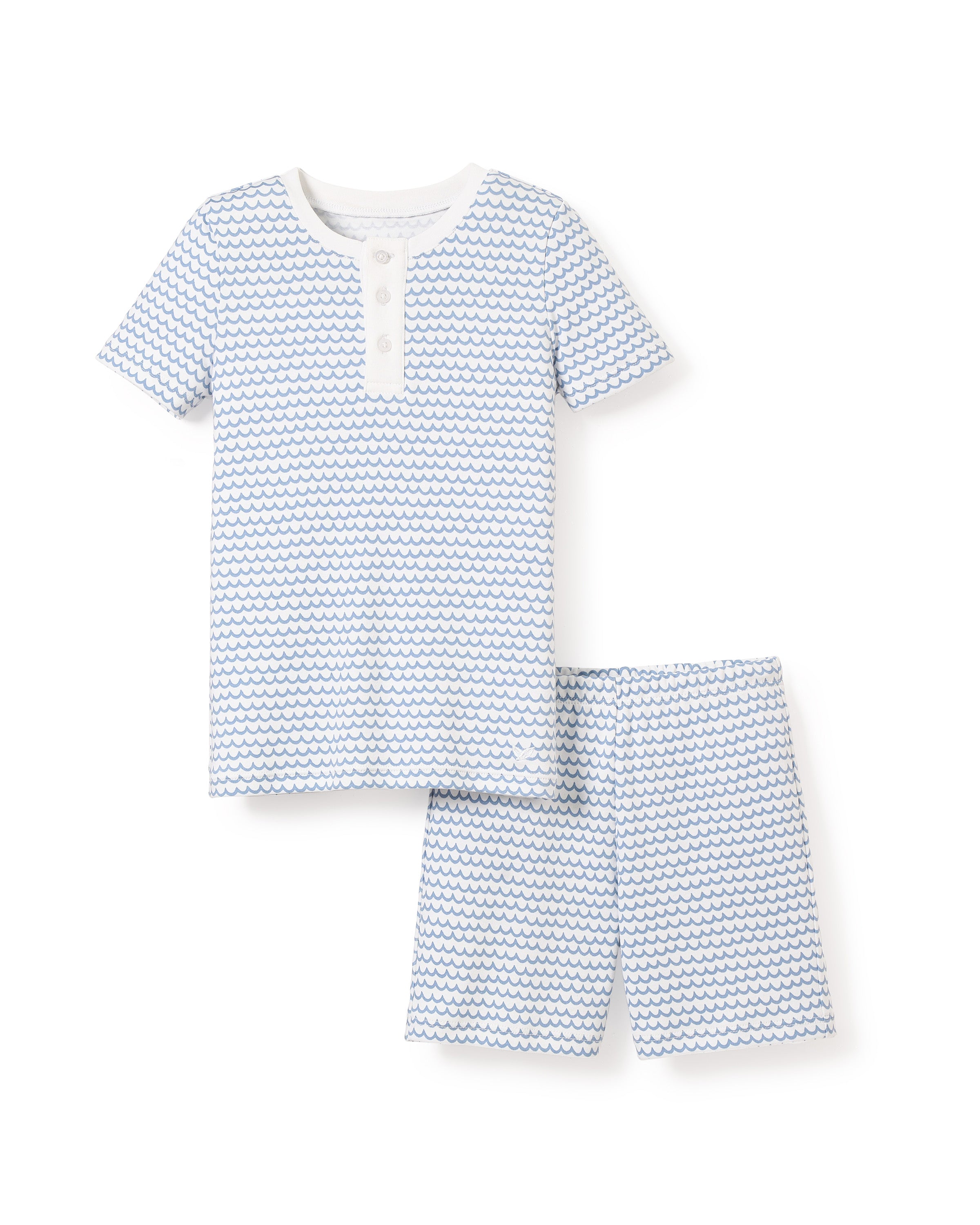 The Kids Pima Snug Fit Pajama Short Set in La Mer by Petite Plume includes a short-sleeve, button-up top and matching shorts in a calming blue and white wave design, crafted from luxurious Pima cotton for comfort during peaceful nights.
