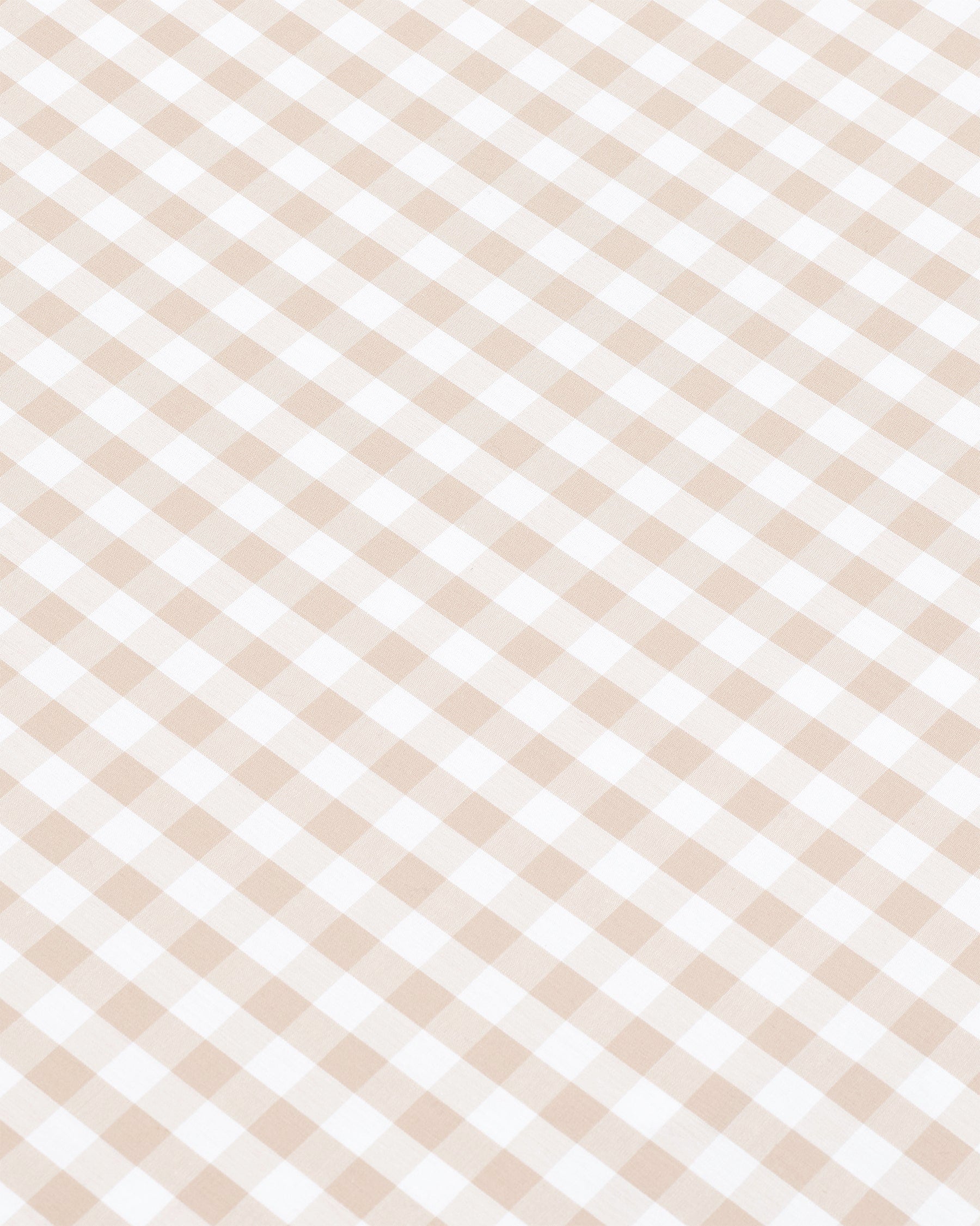 A neatly folded set of Luxe Premium Percale Bed Sheets in Camel Gingham, featuring a beige and white check pattern, displayed against a white background.