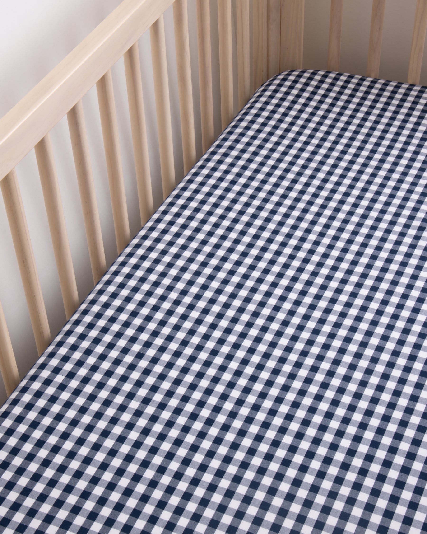 Luxe Premium Cotton Crib Sheet in Navy Gingham in Light Blue Gingham#Color_Navy Gingham