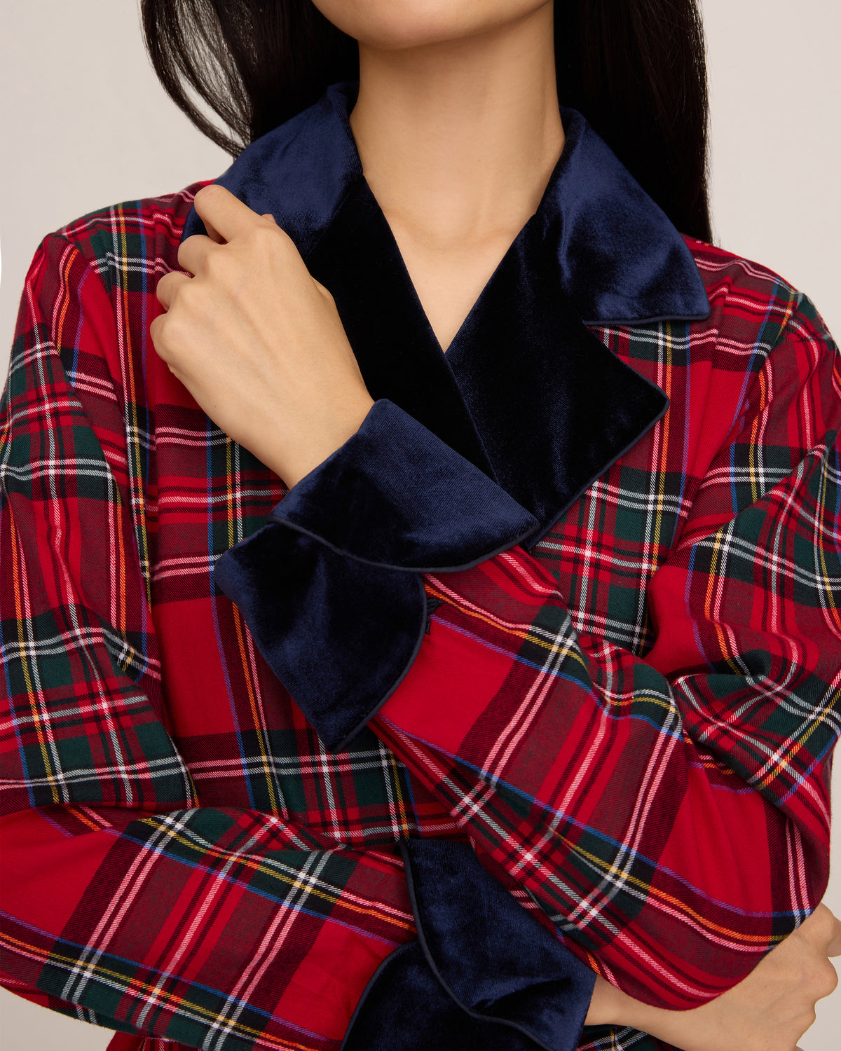 The Women's Long Robe with Velvet Trim in Imperial Tartan features a red plaid pattern, navy blue velvet collar and cuffs, matching belt, and two front pockets, displayed flat on a white background.