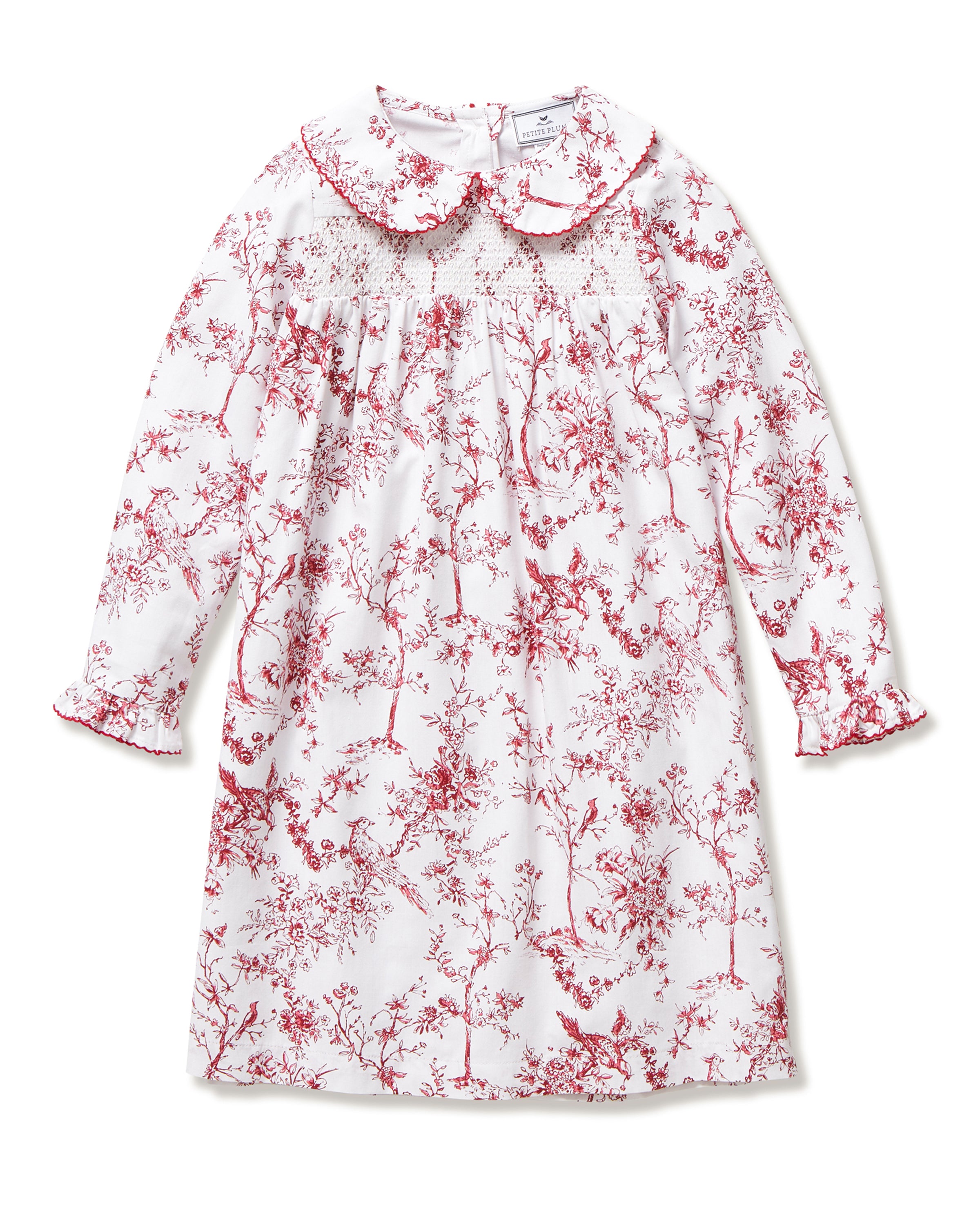 The Girl's Twill Eloise Nightgown in Red Timeless Toile features long sleeves, a white base with red nature-inspired print, gathered yoke, ruffled cuffs, and a scalloped Peter Pan collar.