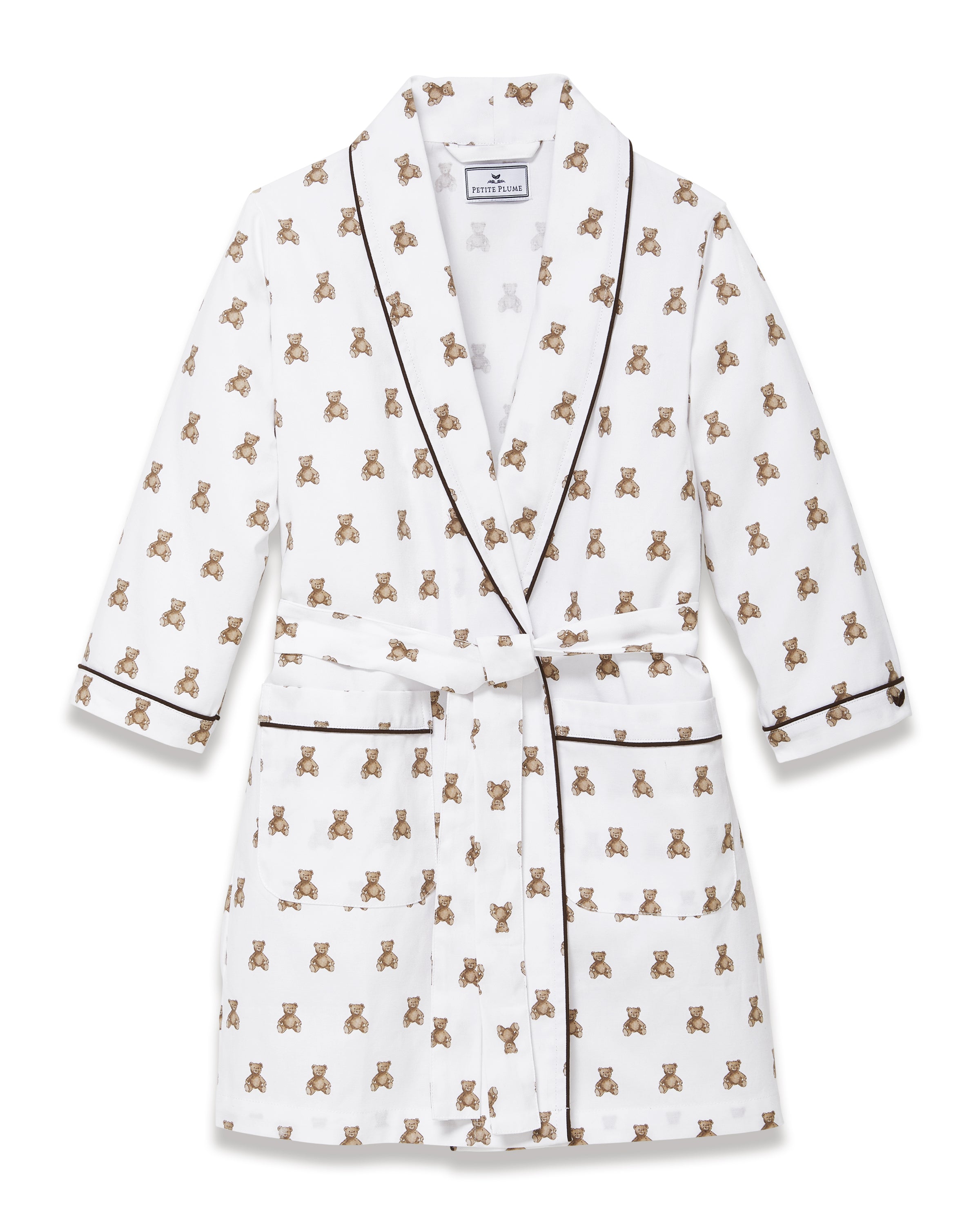 The Kid's Brushed Twill Robe in Teddy Tales features a white base with brown bear prints, black piping, two front pockets, and a matching waist belt.