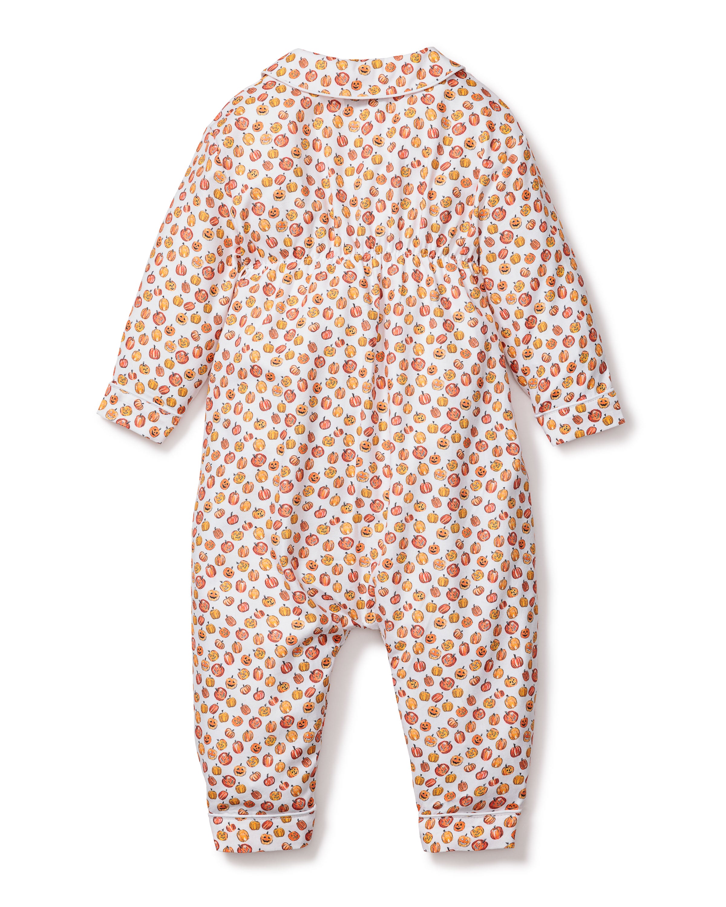The Babys Twill Cambridge Romper in Pumpkin Patch by Petite Plume is a white long-sleeve onesie with a playful print of small orange and red apples, featuring a collar and back zipper or button closure.