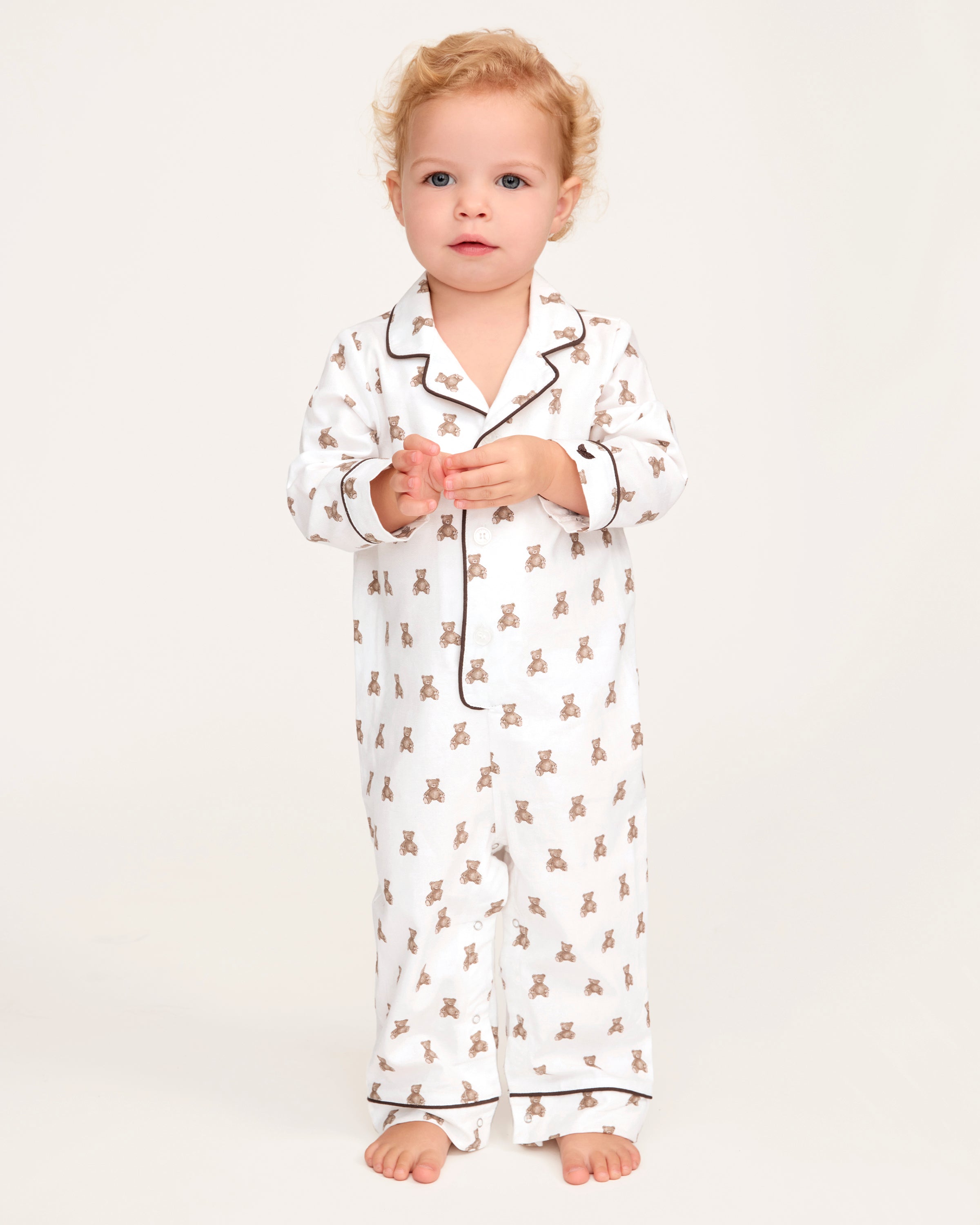 A white and brown Baby's Twill Classic Romper in Teddy Tales.