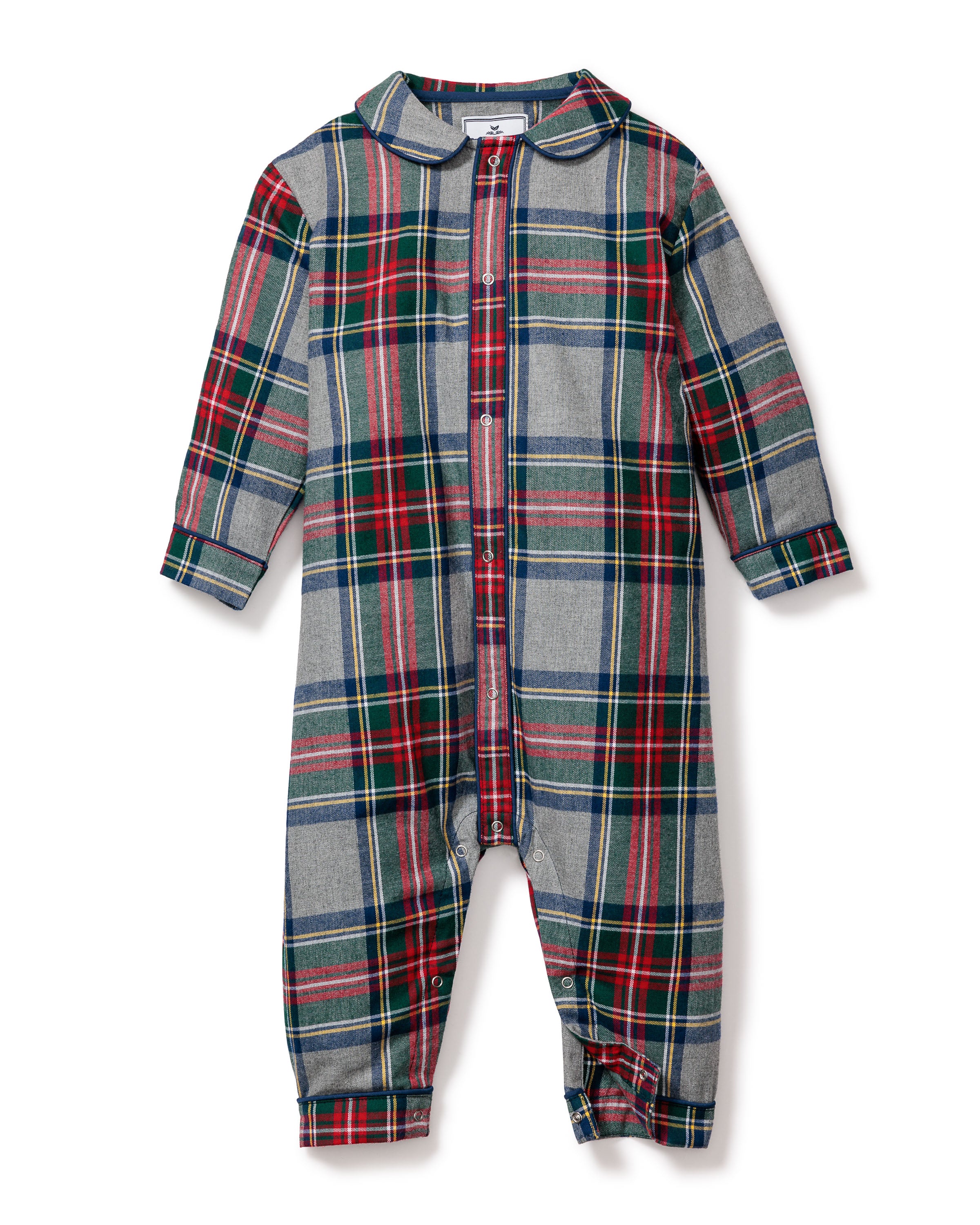 The Babys Brushed Cotton Cambridge Romper in Westminster Tartan by Petite Plume features a red, green, and blue tartan pattern. Crafted from flame-retardant fabric, it has long sleeves, a collar, and front buttons. The romper is laid flat on a white background.