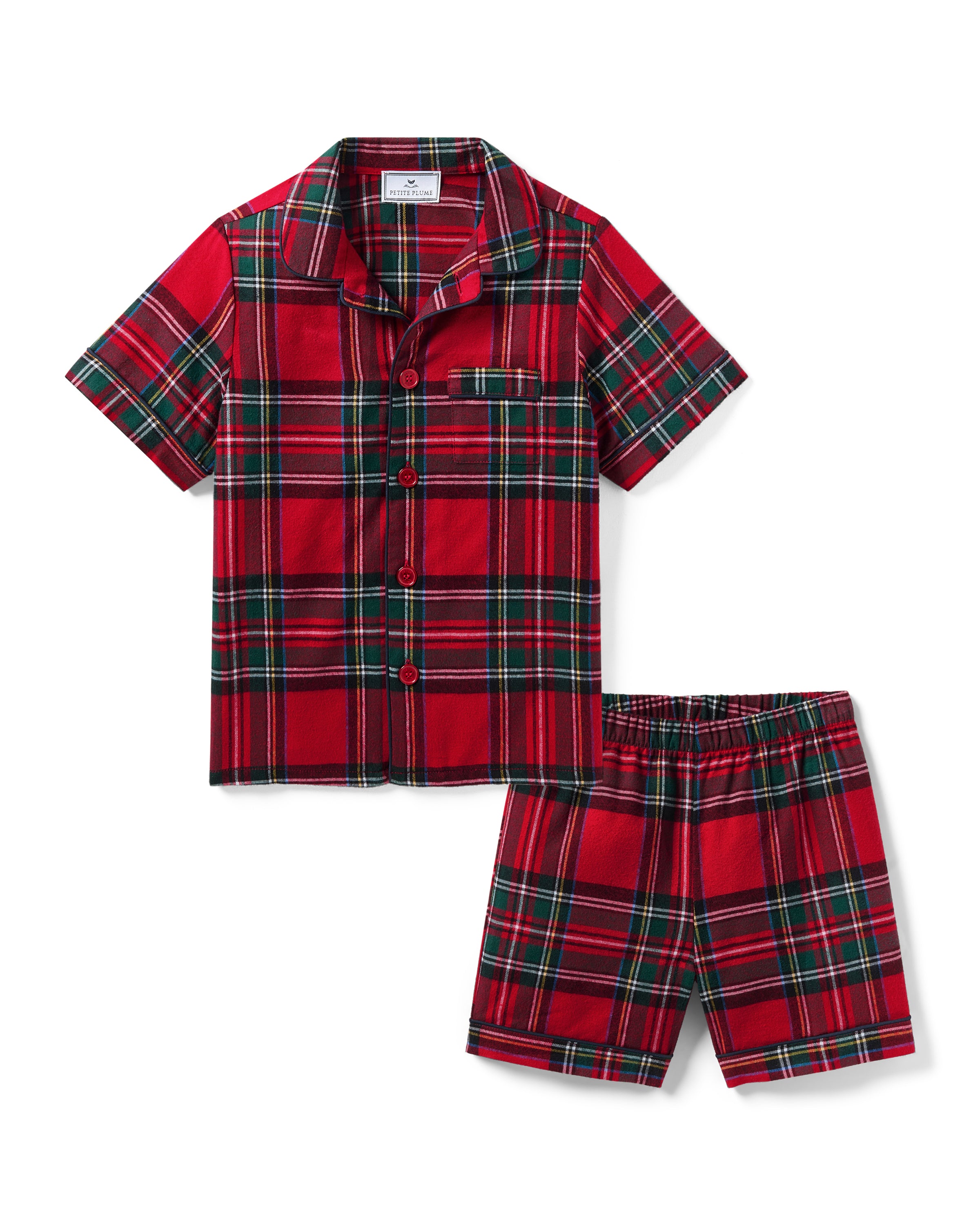 The Kid's Brushed Twill Short Set in Imperial Tartan features red plaid with green, black, and white stripes, including a short-sleeve button-up shirt with a chest pocket and matching elastic waistband shorts.
