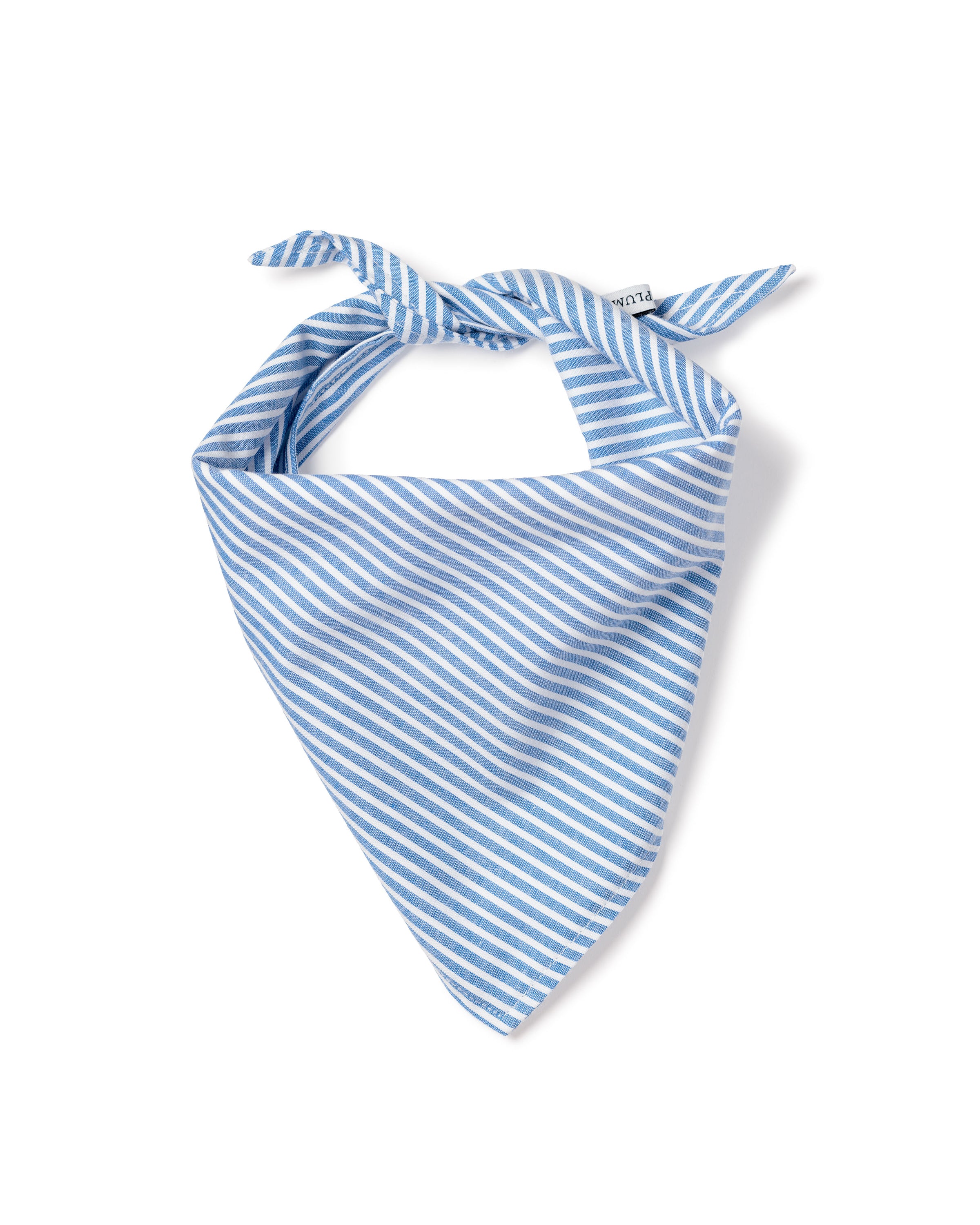 The Twill Dog Bandana in French Blue Seersucker features light blue and white stripes, tied at the top with two ends out, and is shown laid flat on a white background.