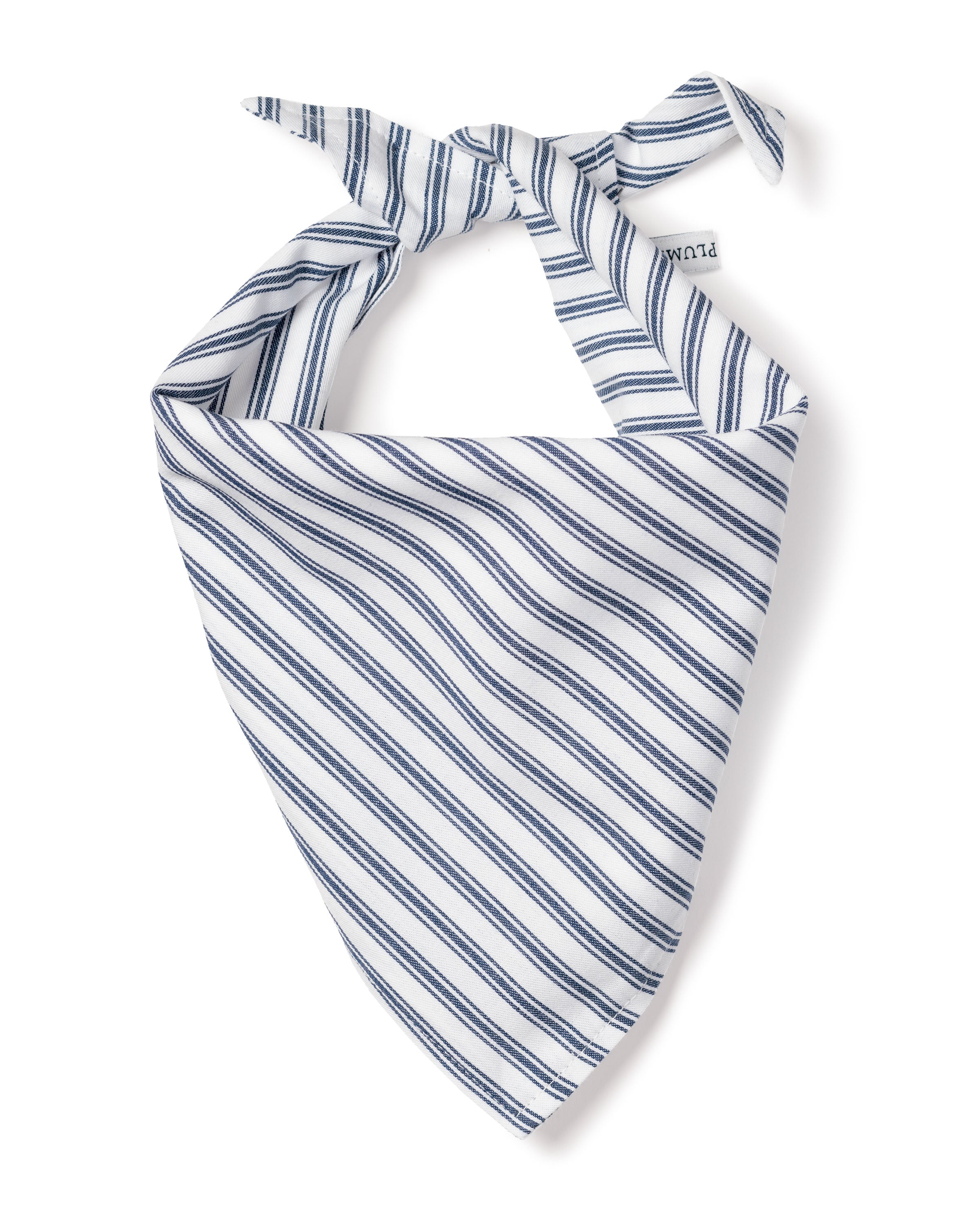 The Petite Plume Dog Twill Bandana in Navy French Ticking, knotted at the top, adds stylish blue and white stripes to your pups accessories.